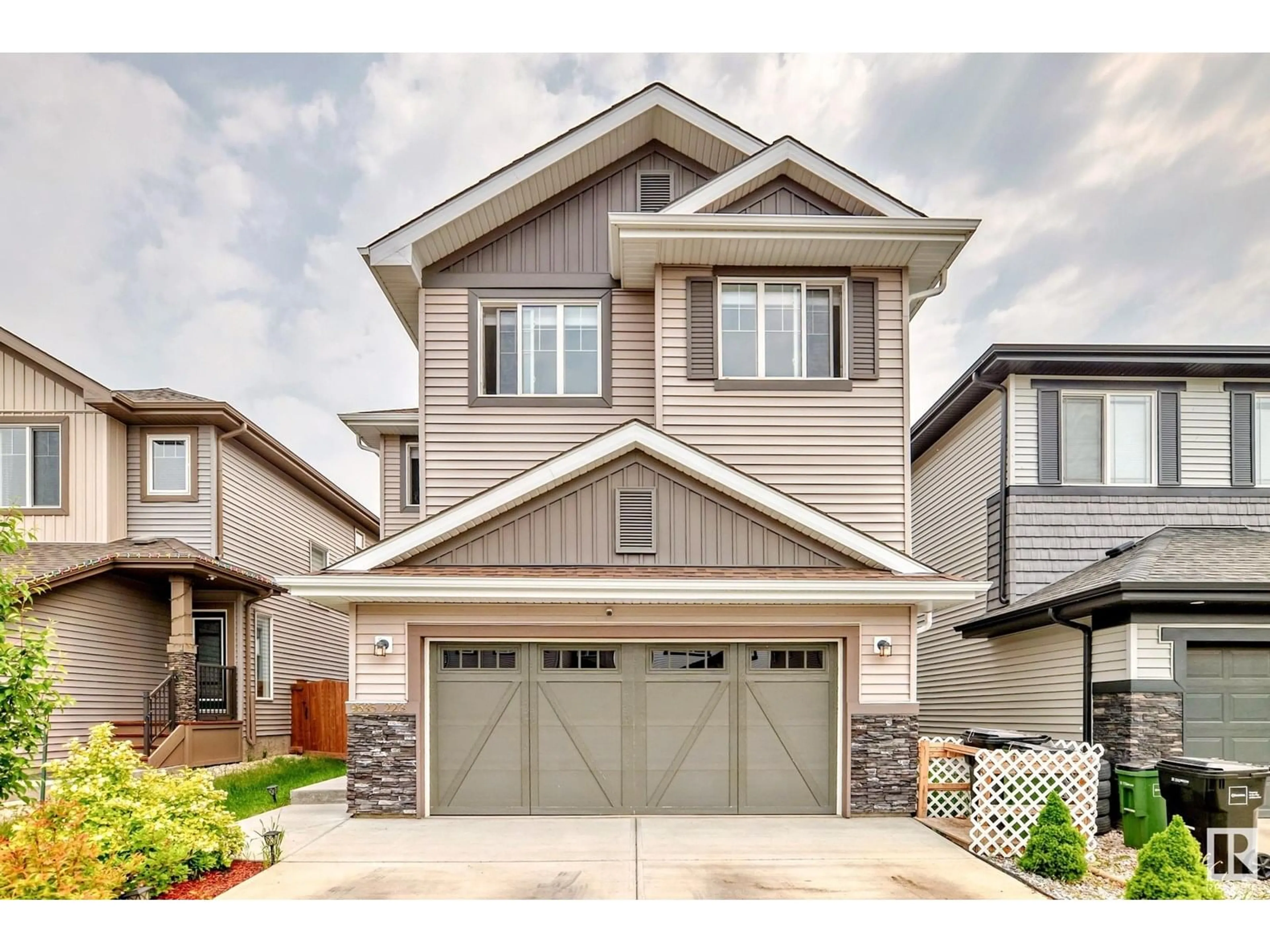 Home with vinyl exterior material, street for NW - 9635 223 ST, Edmonton Alberta T5T7B7