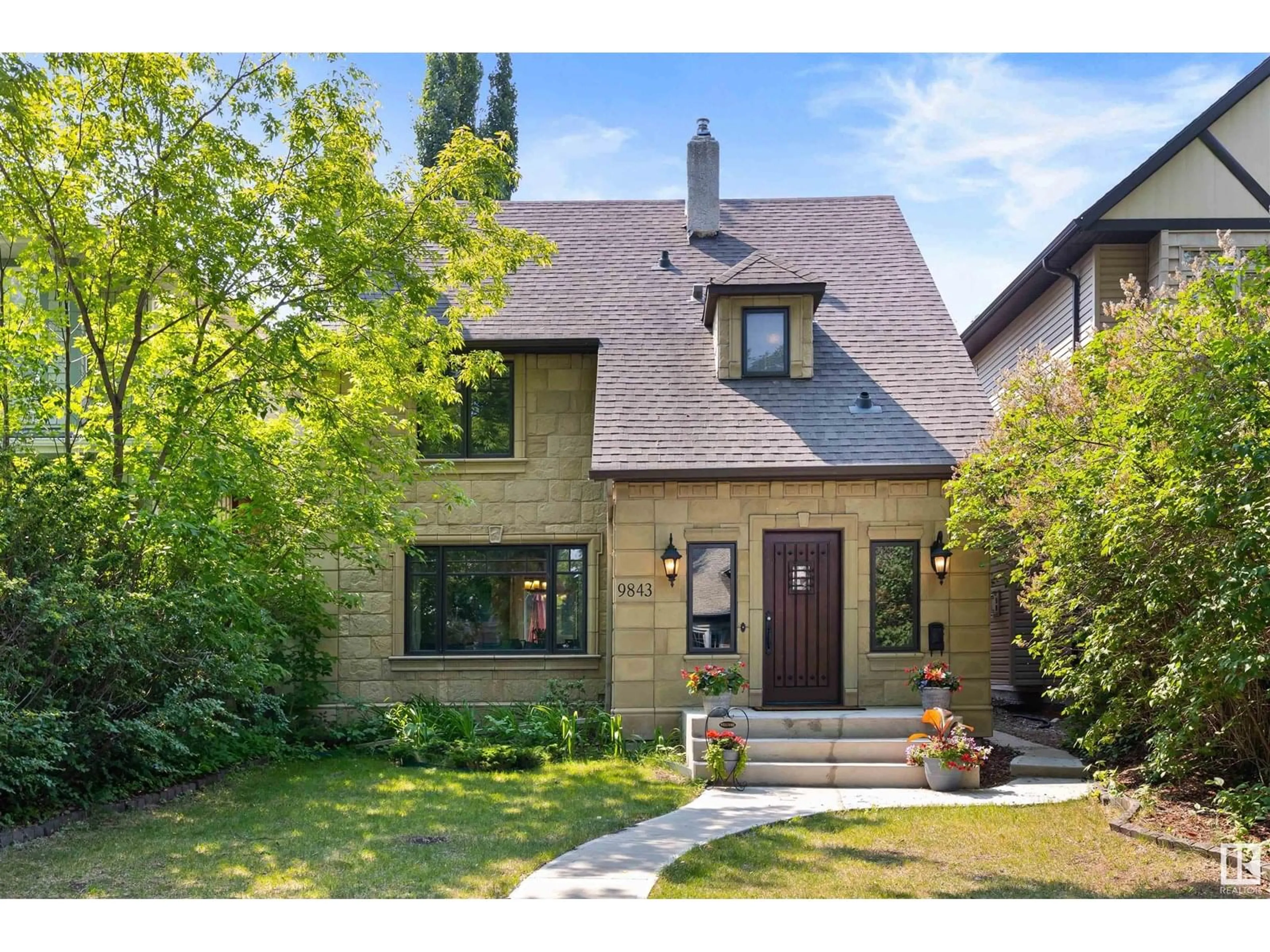 Home with brick exterior material, street for NW - 9843 92 AV, Edmonton Alberta T6E2V4