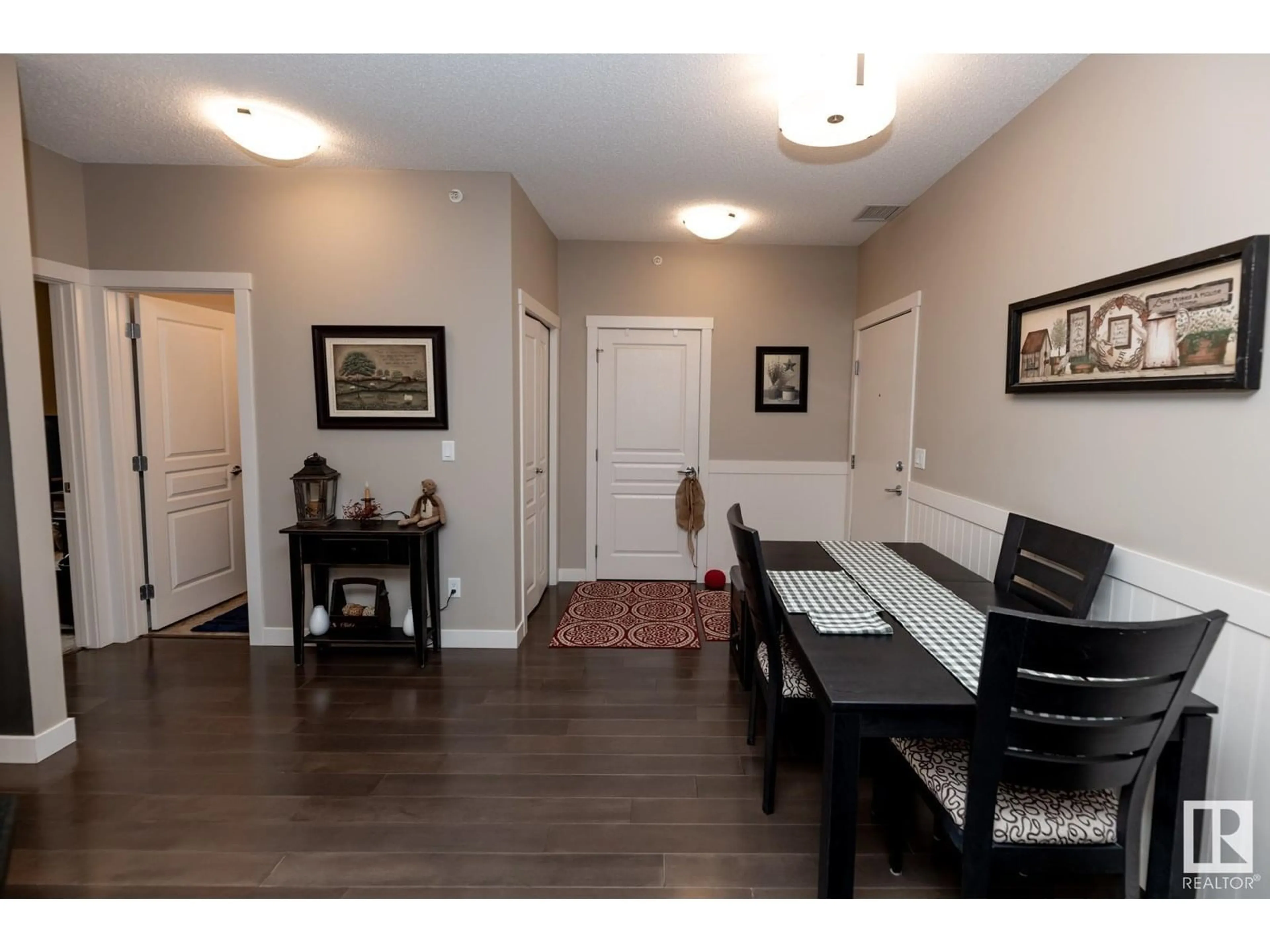 Dining room, wood/laminate floor for #403 - 2207 44 AV NW, Edmonton Alberta T6T0T2