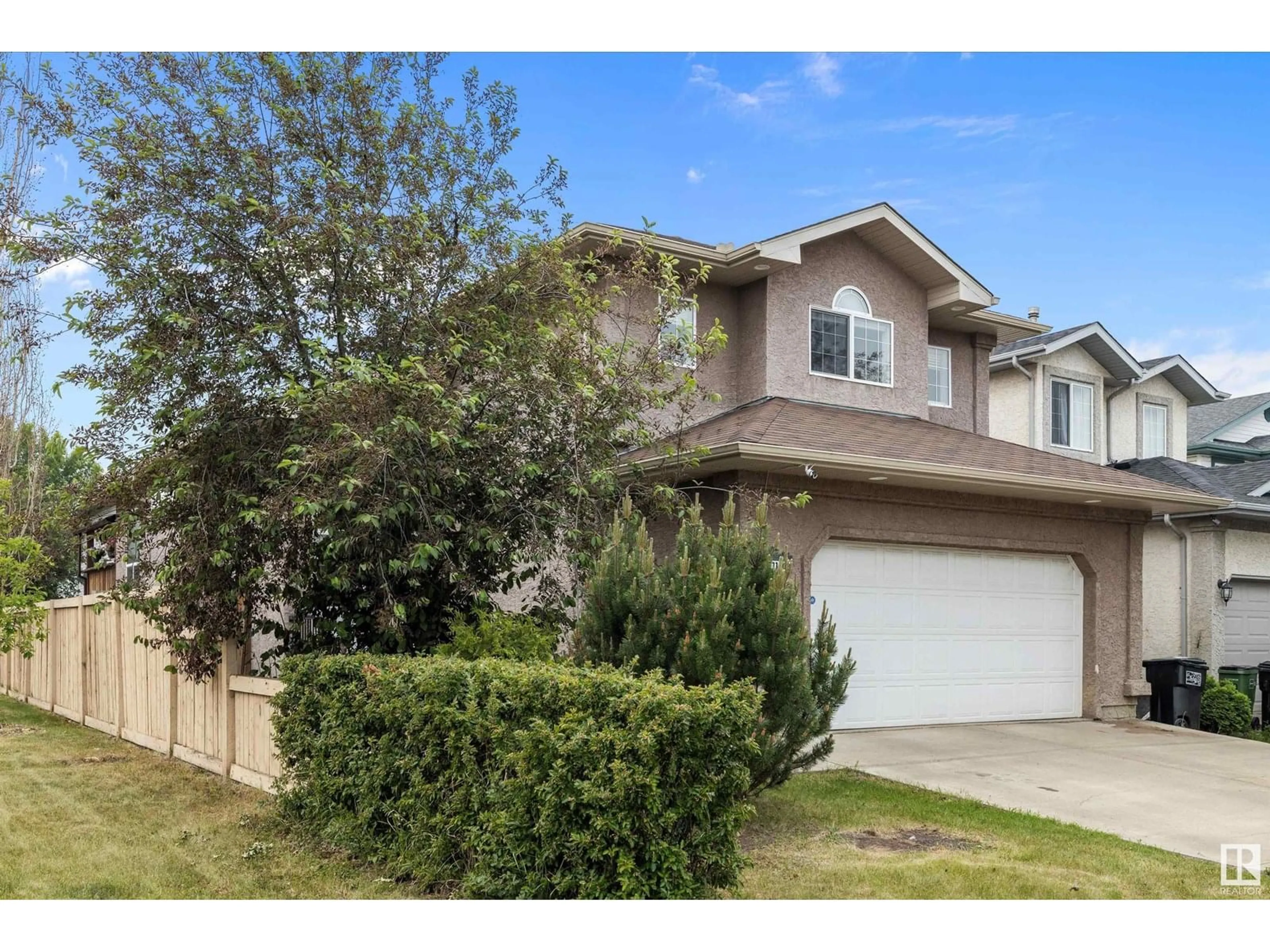 Home with vinyl exterior material, street for 11503 168 AV, Edmonton Alberta T5A6B6