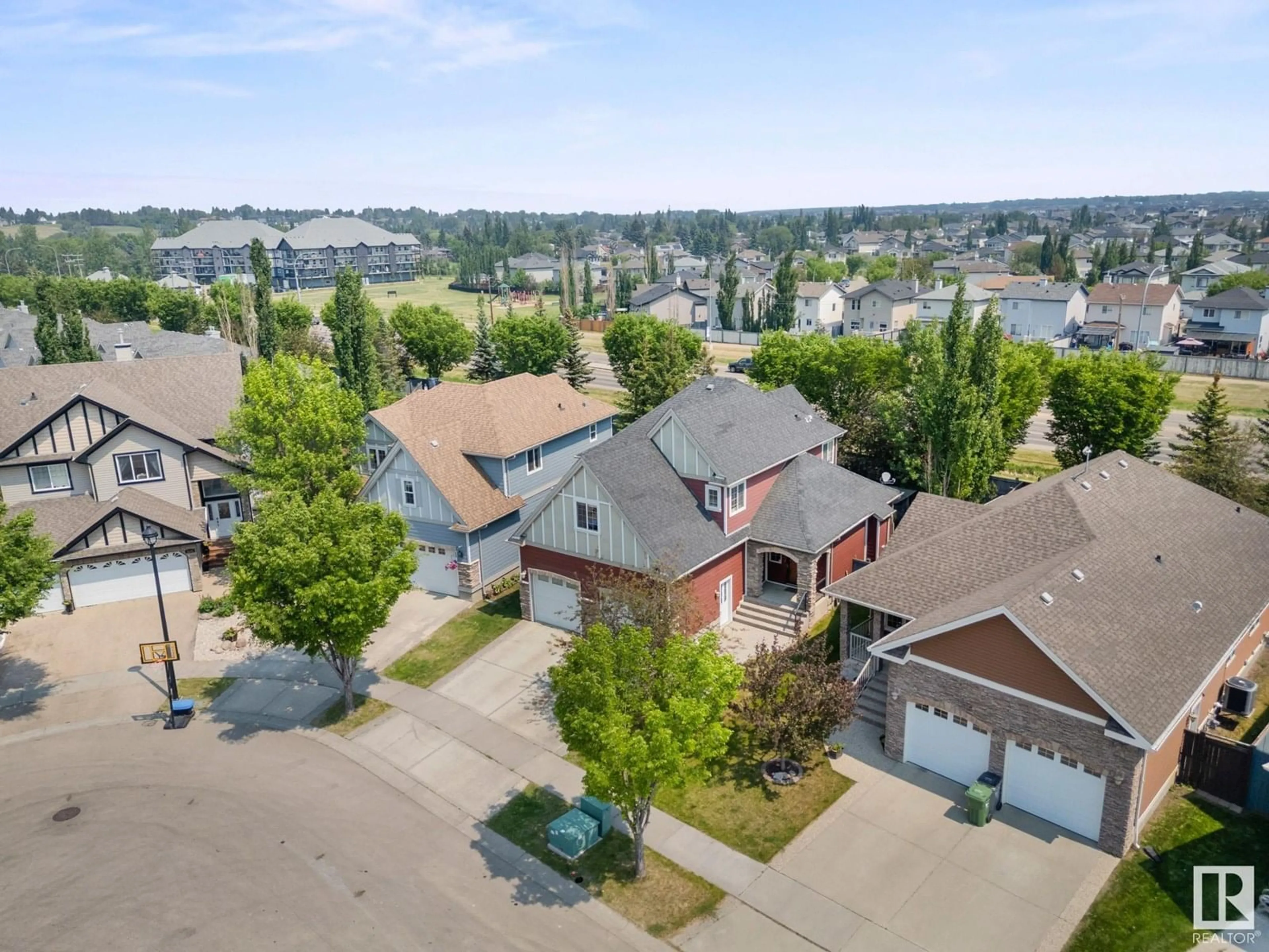 A pic from outside/outdoor area/front of a property/back of a property/a pic from drone, street for 5116 CHATEAU CO, Beaumont Alberta T4X1W5