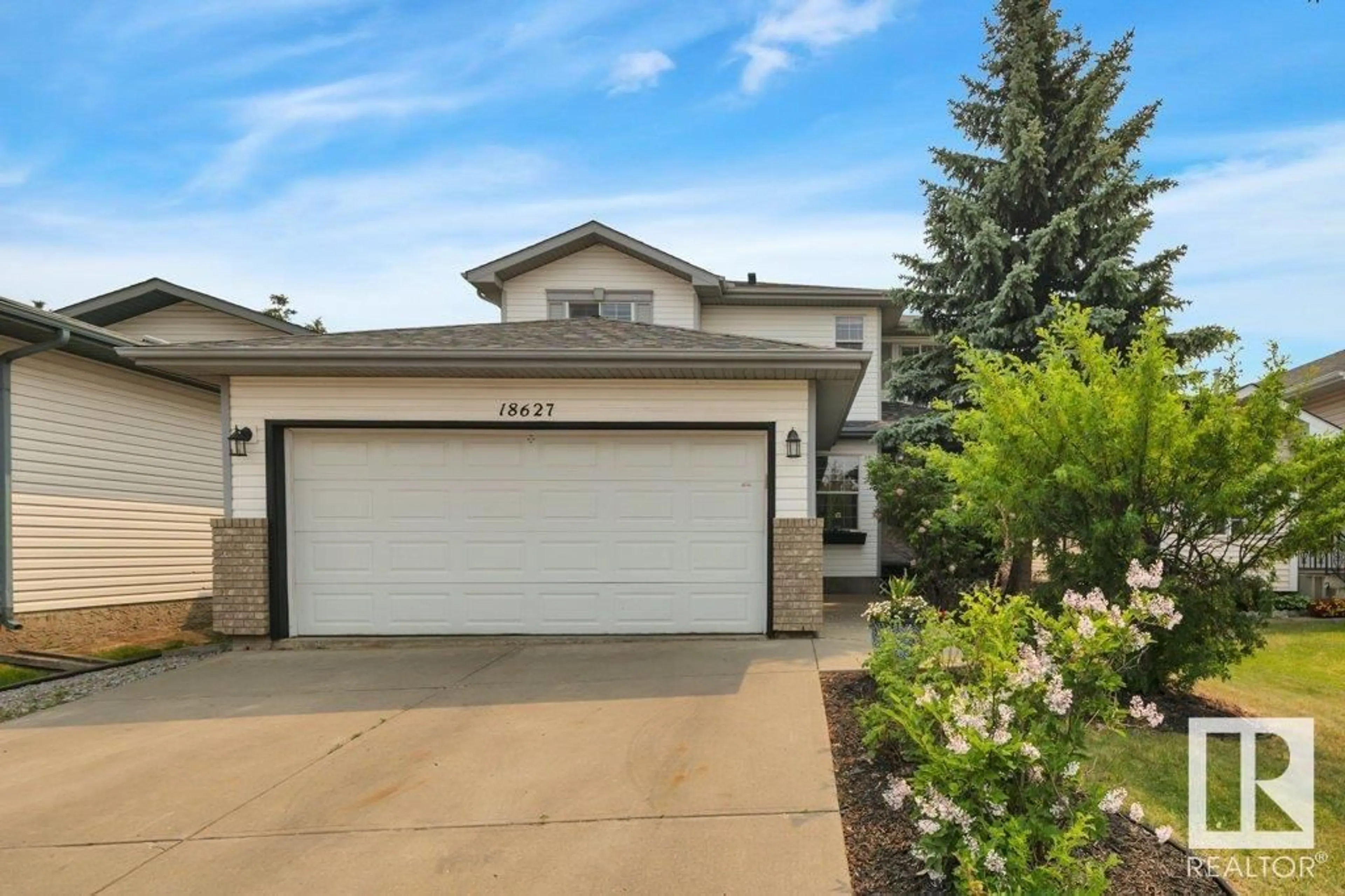 Home with vinyl exterior material, street for 18627 77 AV, Edmonton Alberta T5T6A8