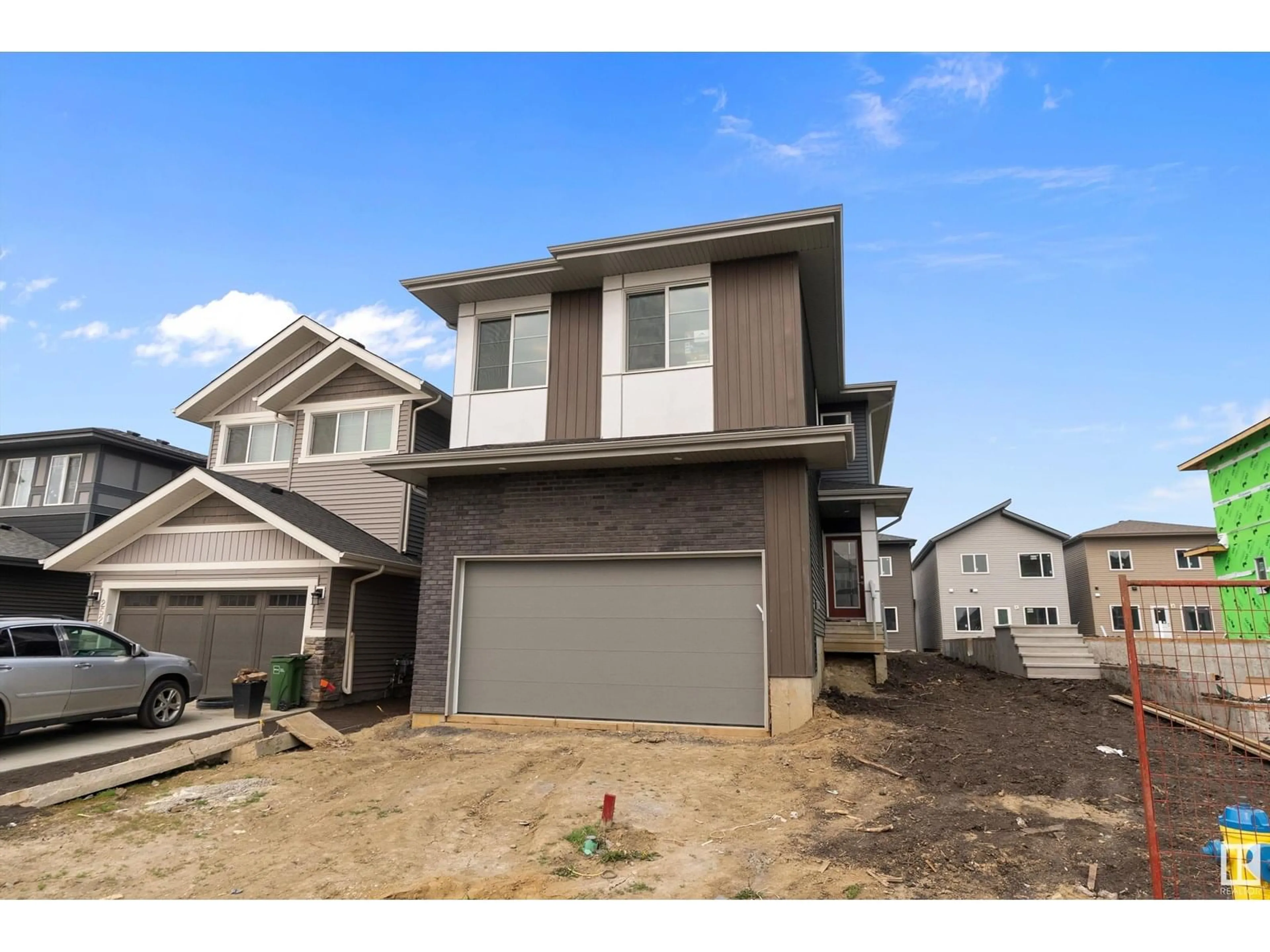 Home with vinyl exterior material, street for NW - 2532 210 ST, Edmonton Alberta T6M2M7