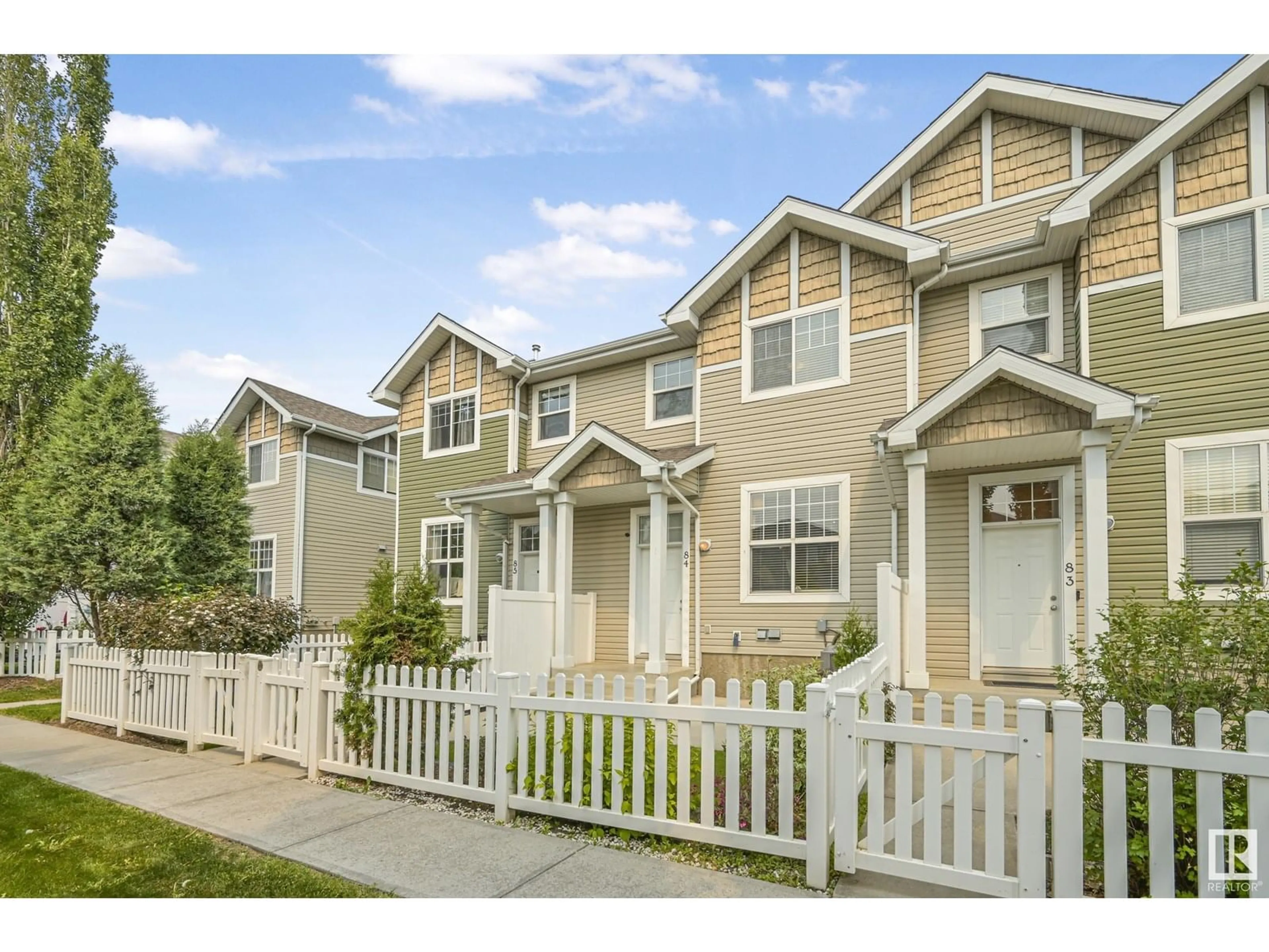 Home with vinyl exterior material, street for #84 - 5604 199 ST, Edmonton Alberta T6M2Z9