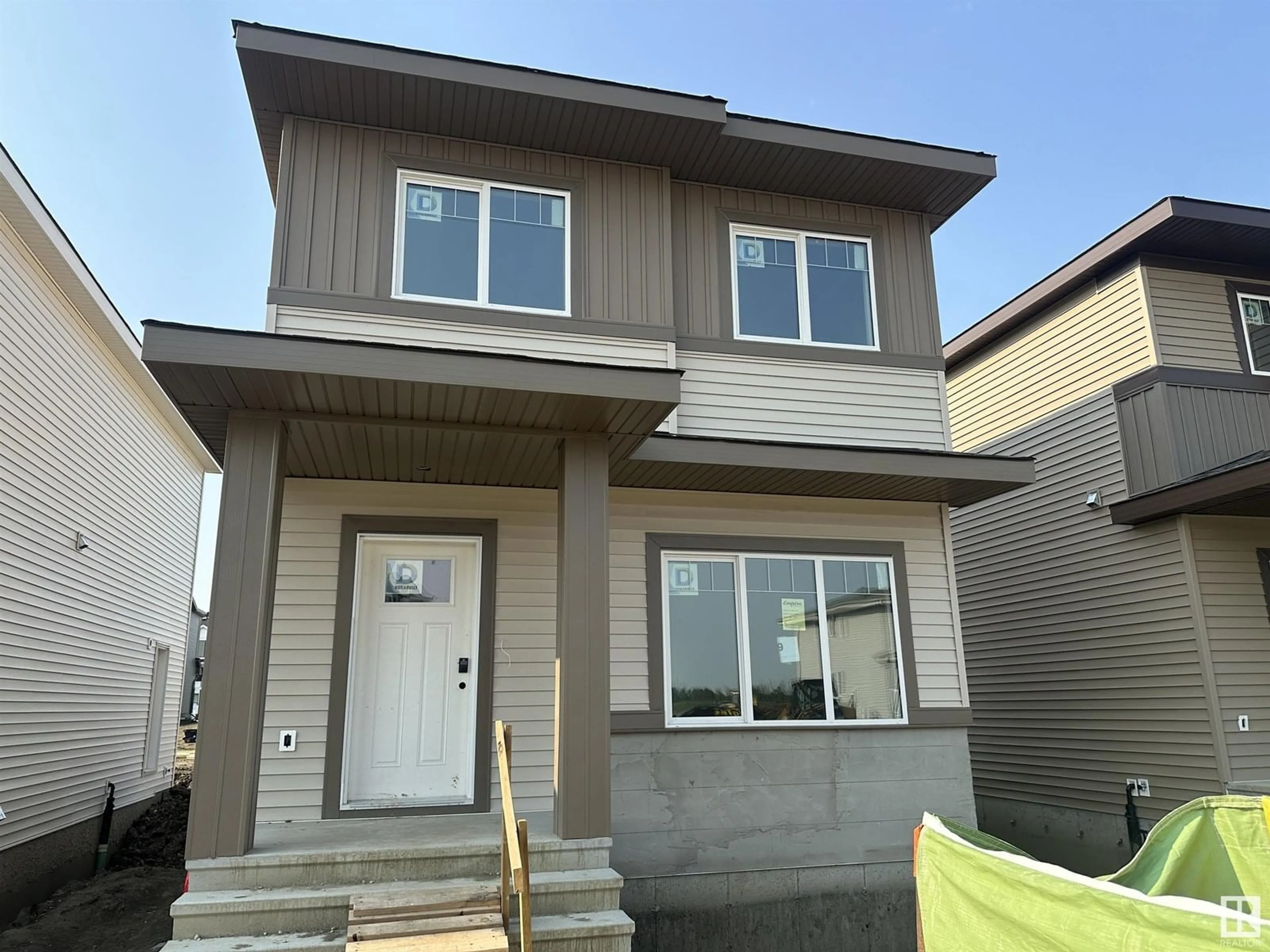 Home with vinyl exterior material, street for 19 ETON LI, Spruce Grove Alberta T7X4B7