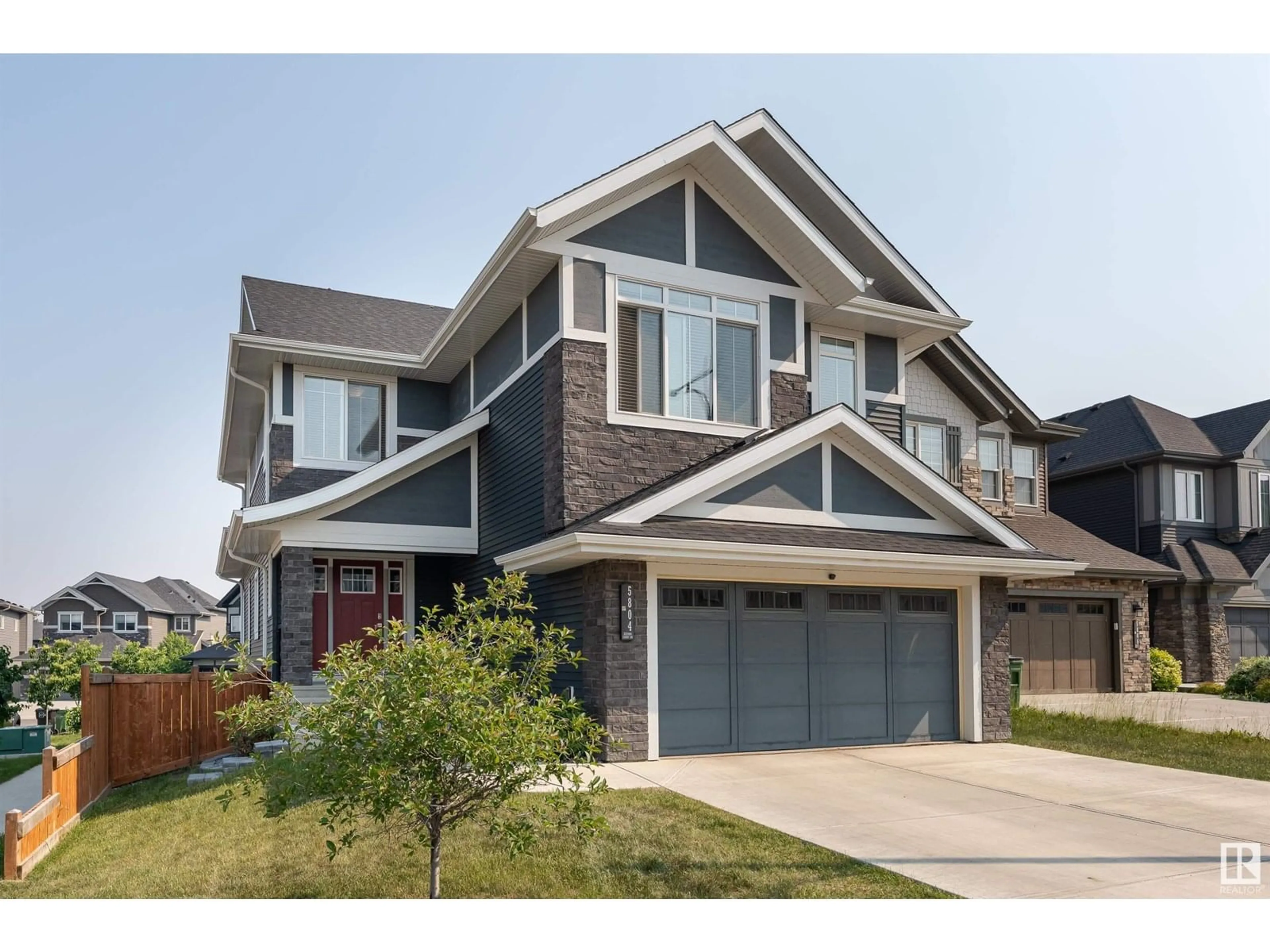 Home with vinyl exterior material, street for 5804 KEEPING CO, Edmonton Alberta T6W4K4