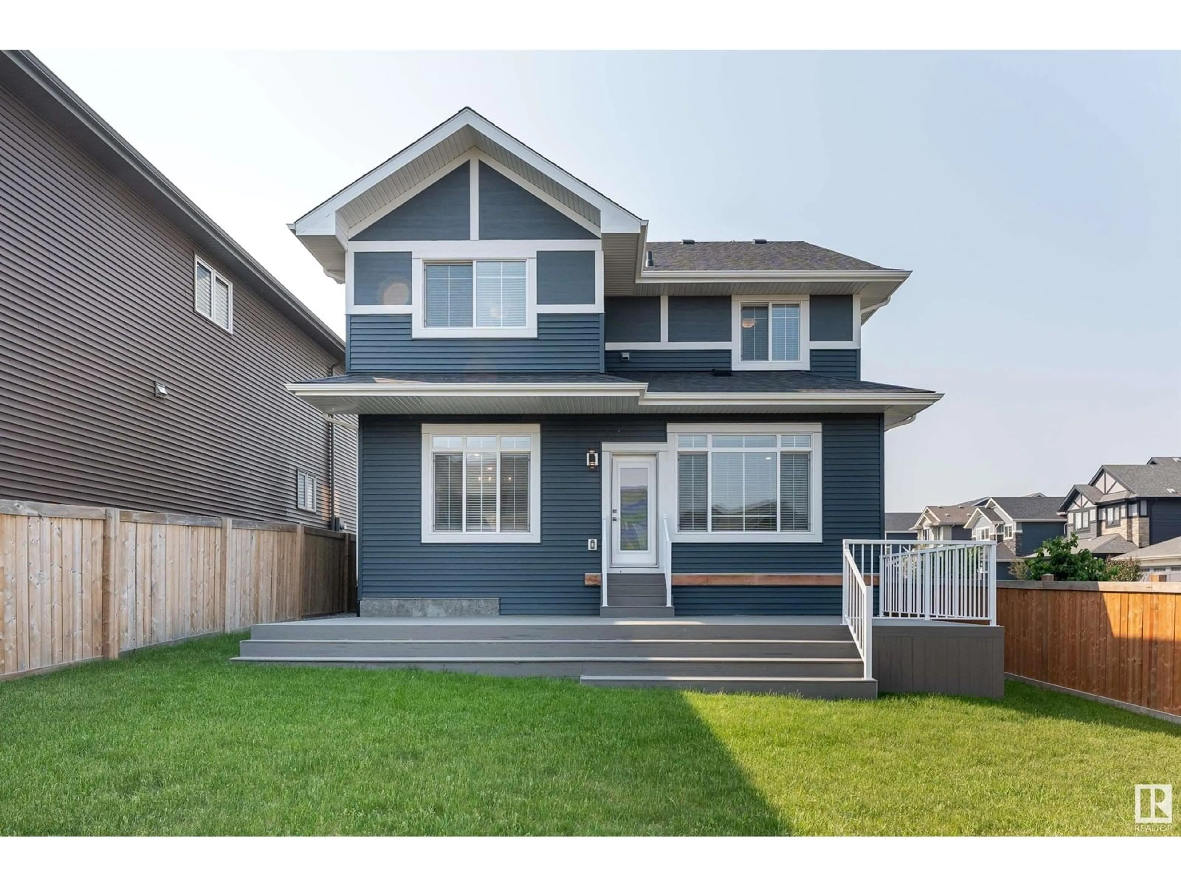 Home with vinyl exterior material, street for 5804 KEEPING CO, Edmonton Alberta T6W4K4
