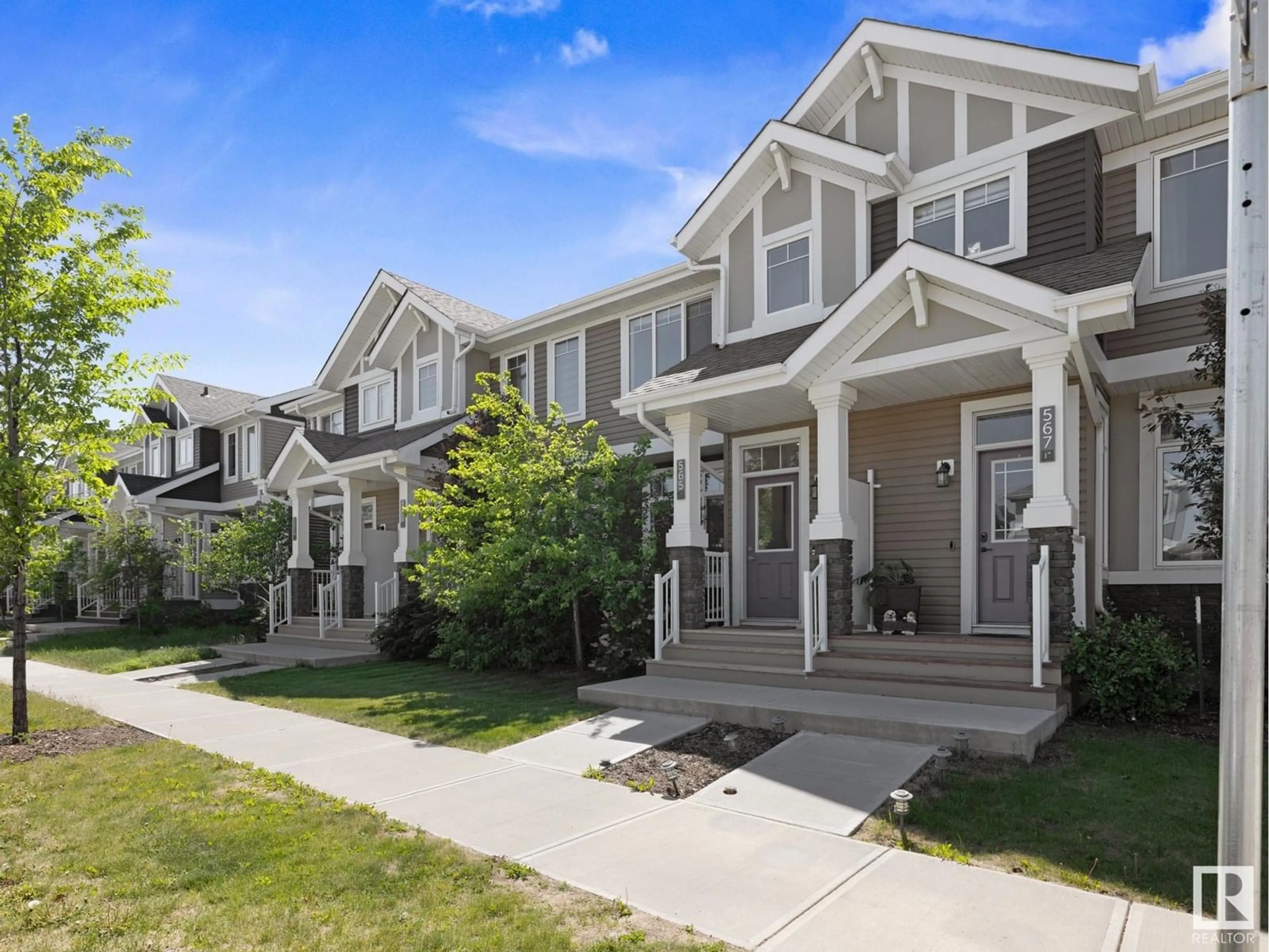 Home with vinyl exterior material, street for 565 GLENRIDDING RAVINE DR, Edmonton Alberta T6W4P1