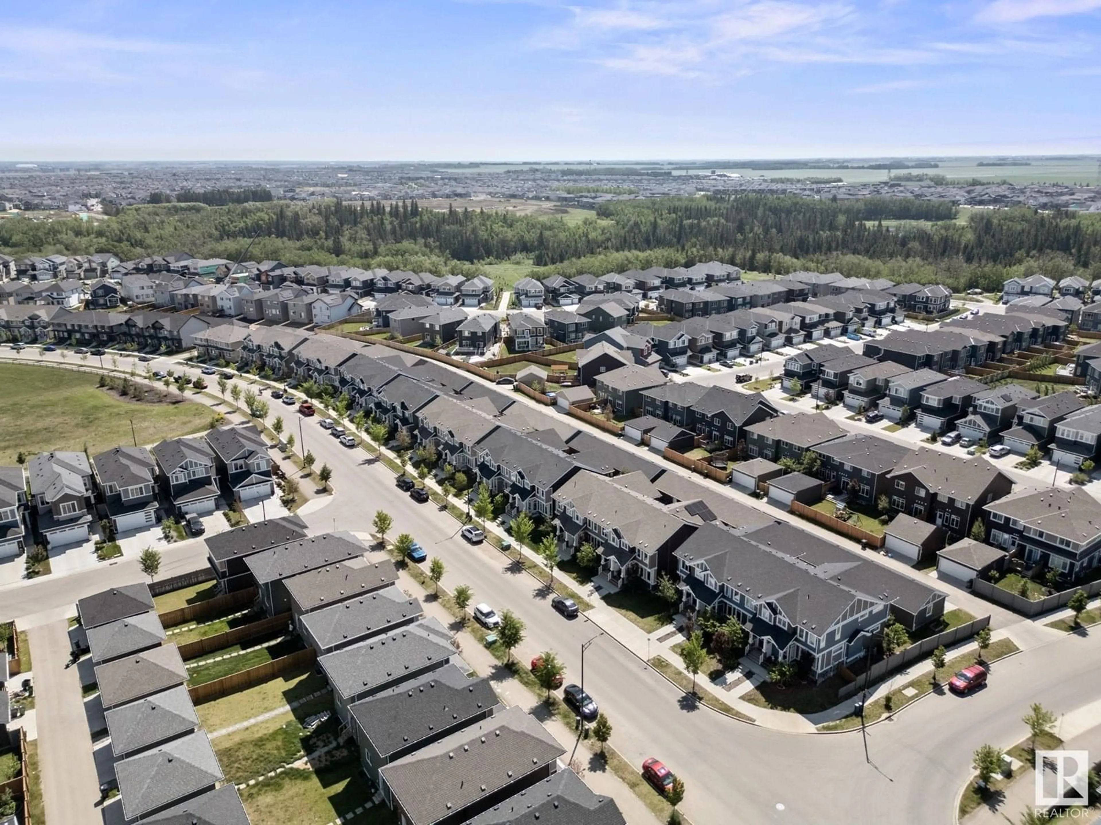 A pic from outside/outdoor area/front of a property/back of a property/a pic from drone, unknown for 565 GLENRIDDING RAVINE DR, Edmonton Alberta T6W4P1