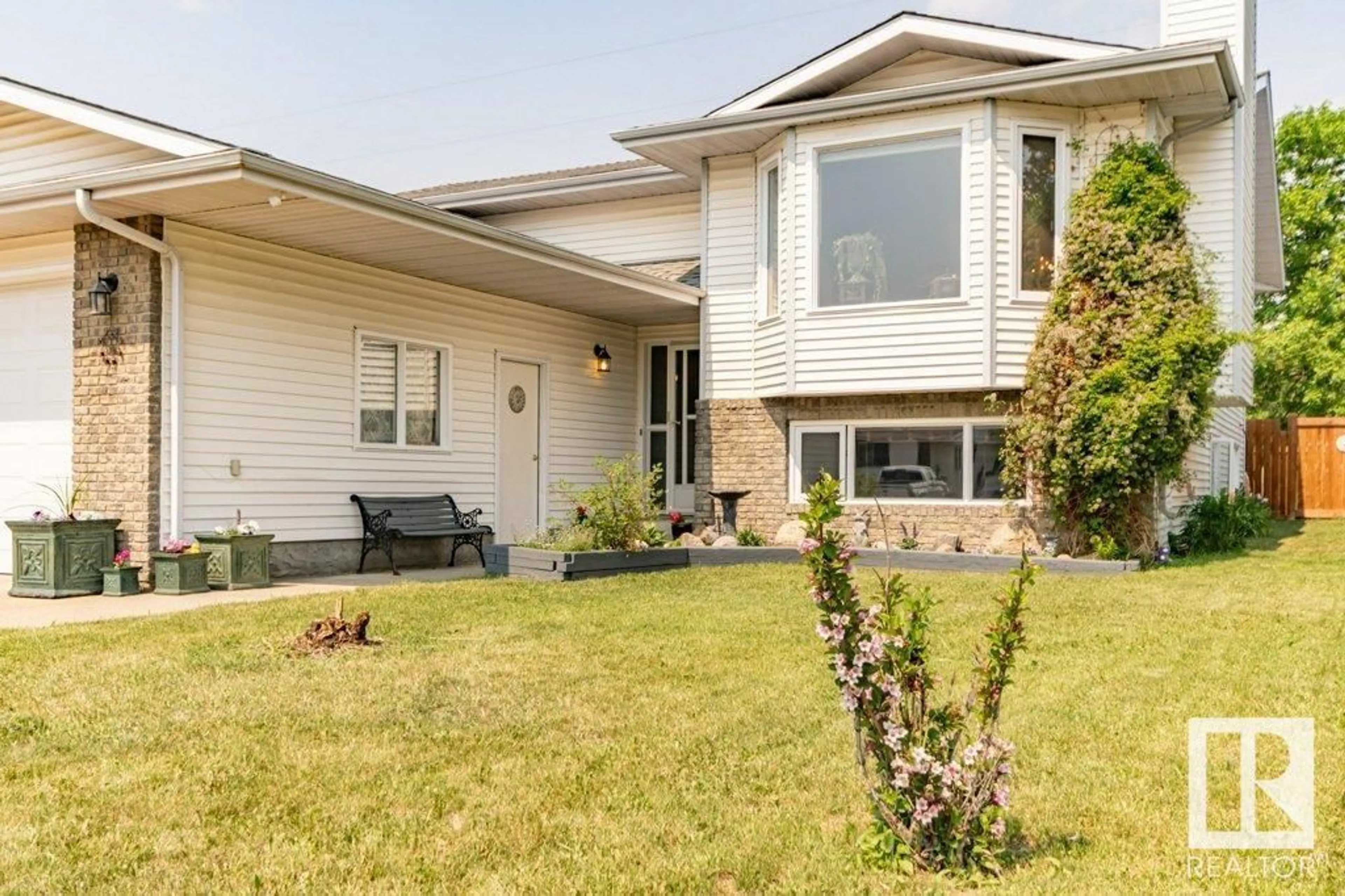 Home with vinyl exterior material, street for 12232 151A AV, Edmonton Alberta T5X4A2
