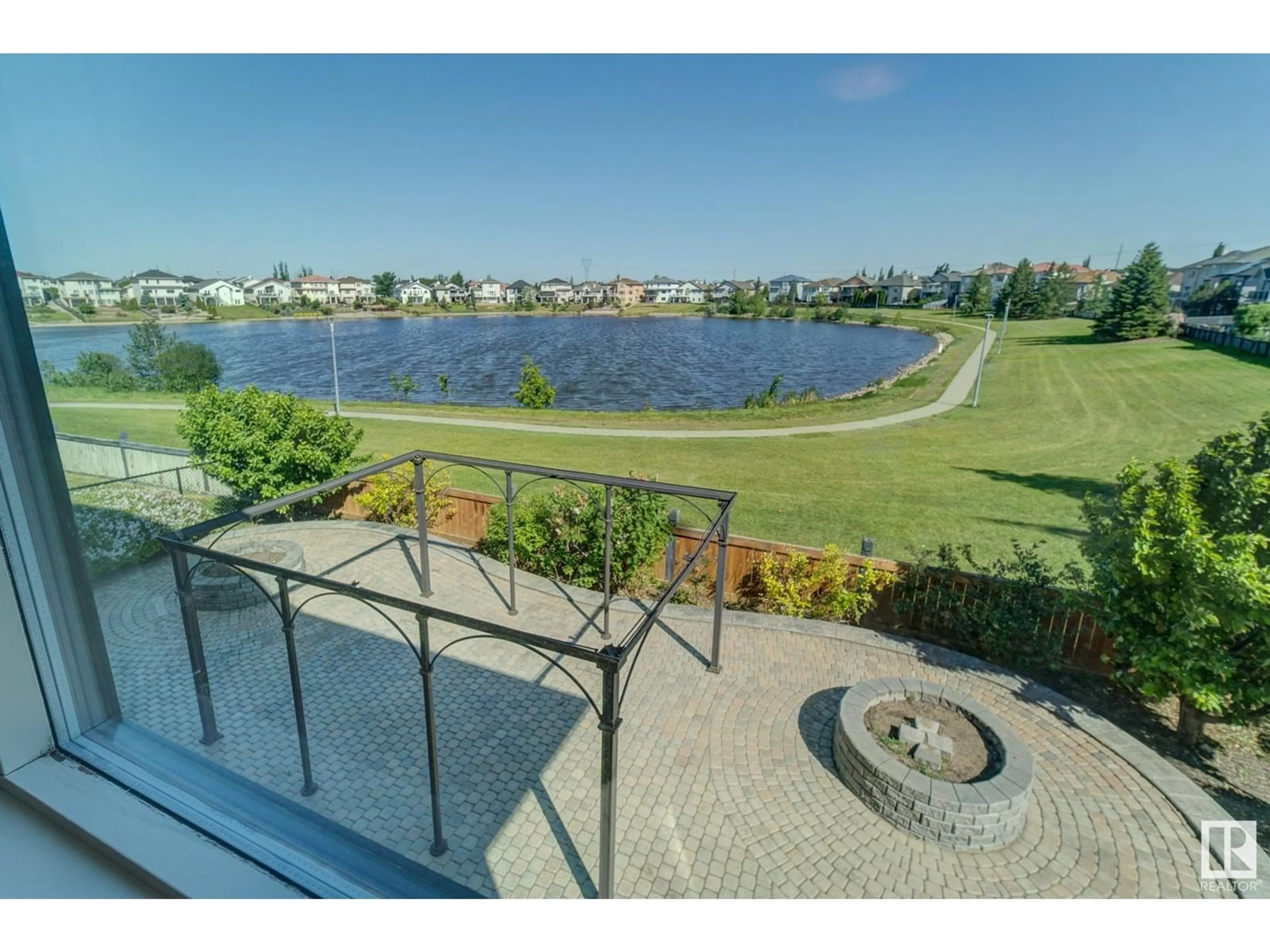 A pic from outside/outdoor area/front of a property/back of a property/a pic from drone, water/lake/river/ocean view for 8716 160A AV, Edmonton Alberta T5Z3K4