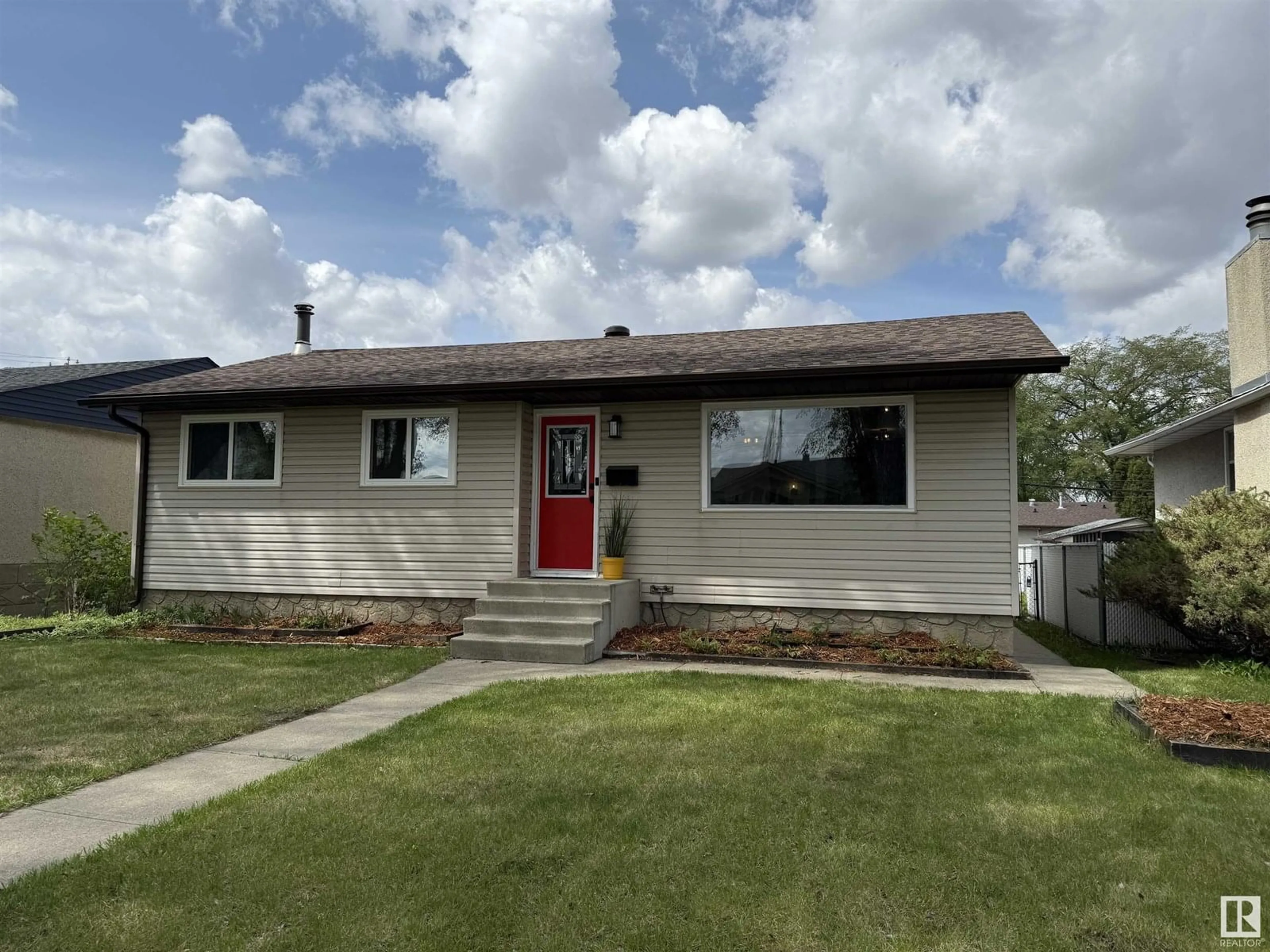 Home with vinyl exterior material, street for NW - 12220 55 ST, Edmonton Alberta T6B1W5