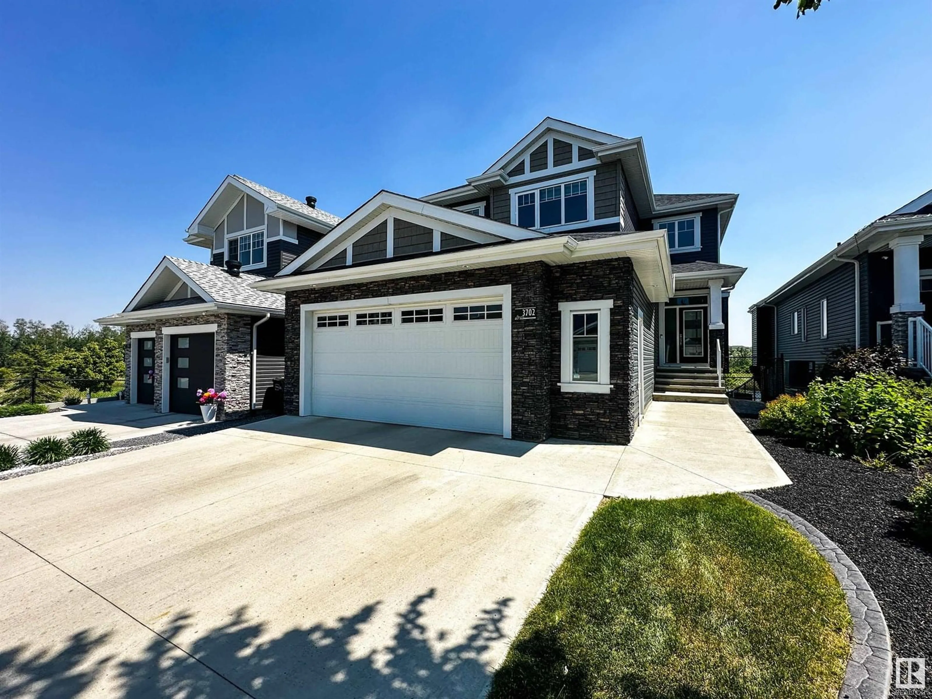 Home with vinyl exterior material, street for 3702 HUMMINGBIRD WY, Edmonton Alberta T5S0L1