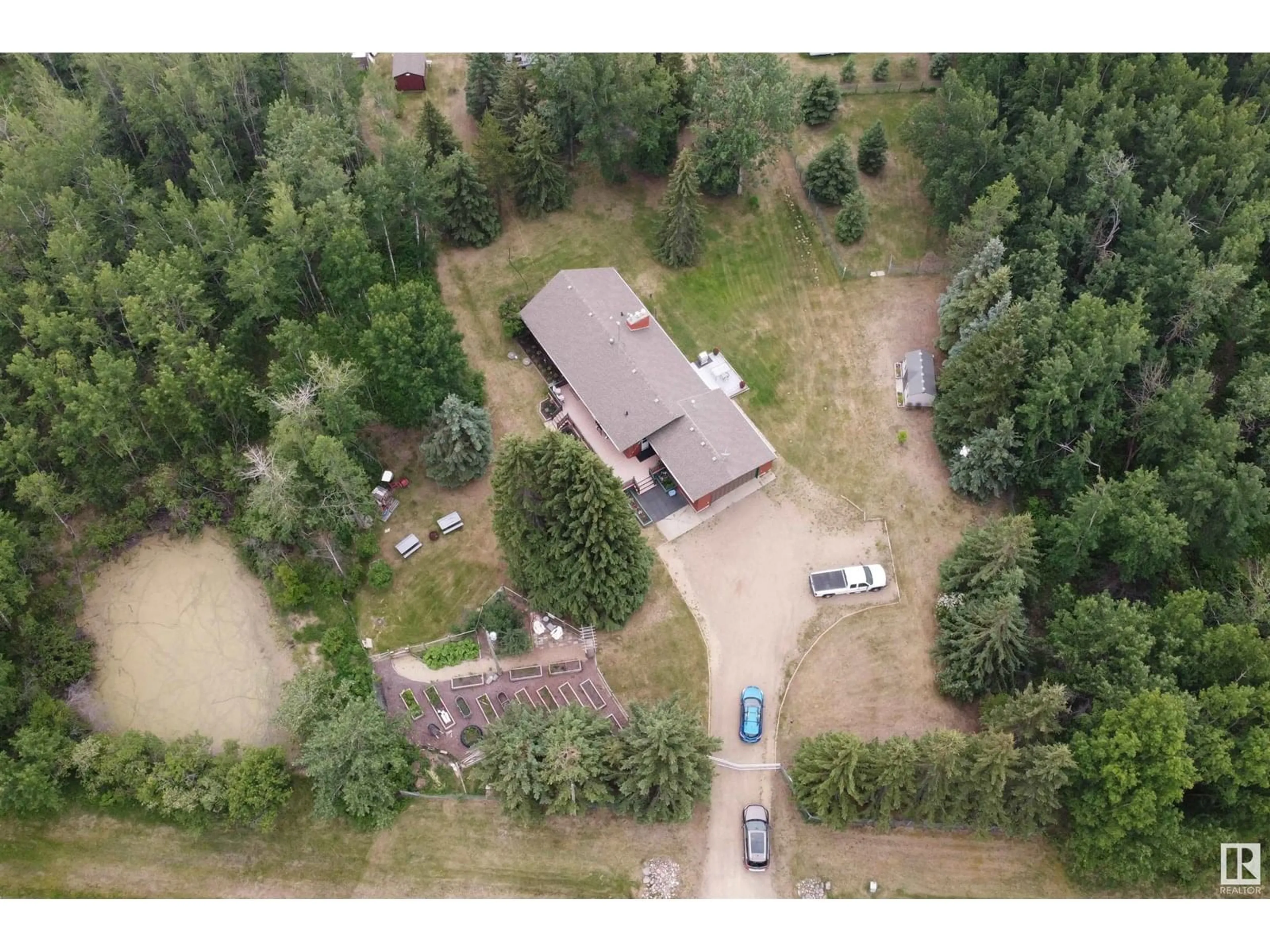 A pic from outside/outdoor area/front of a property/back of a property/a pic from drone, unknown for 21349 TWP ROAD 530, Rural Strathcona County Alberta T8G2G1