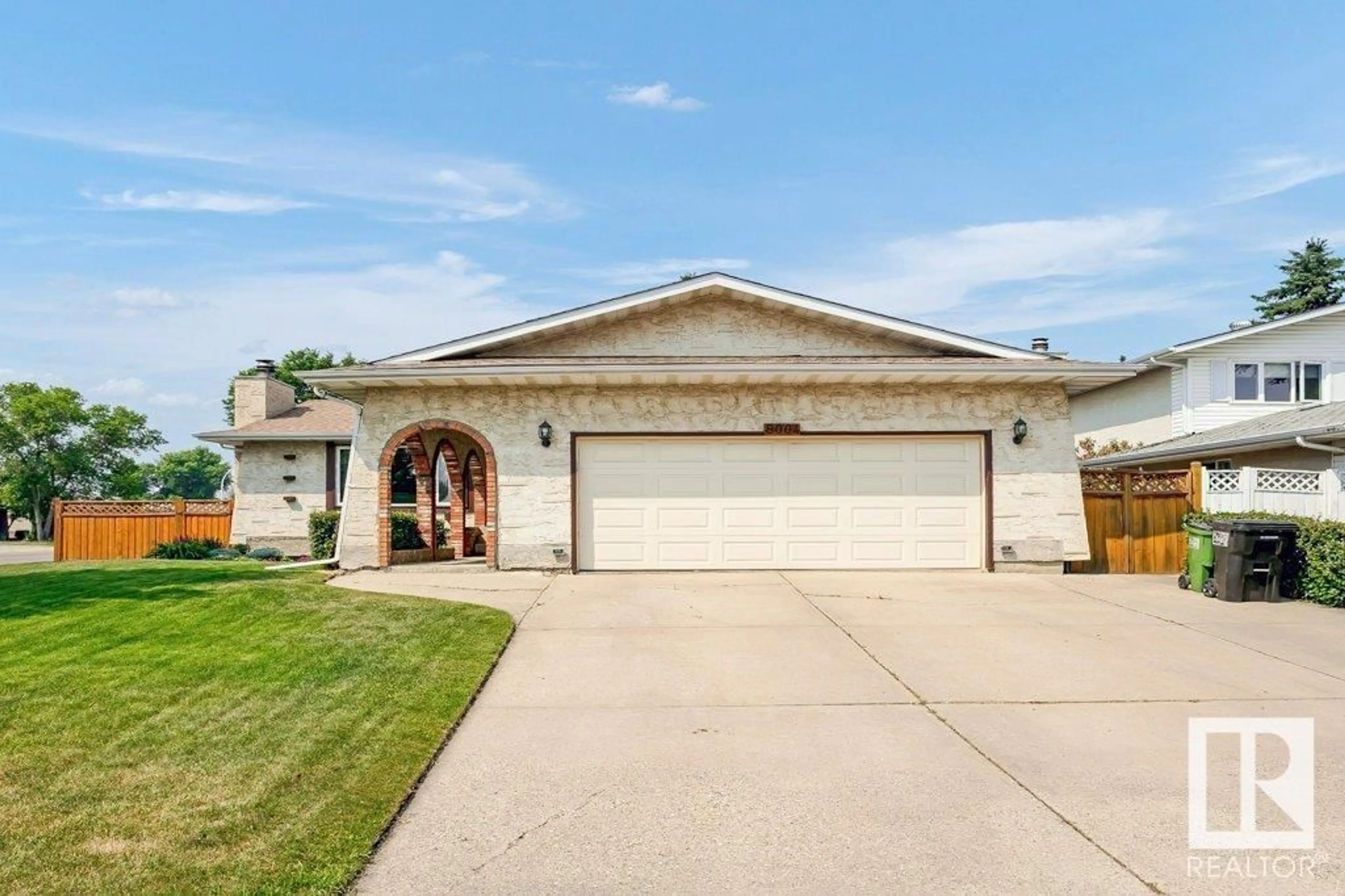 Home with vinyl exterior material, street for NW - 8004 182 ST, Edmonton Alberta T5T0Z8