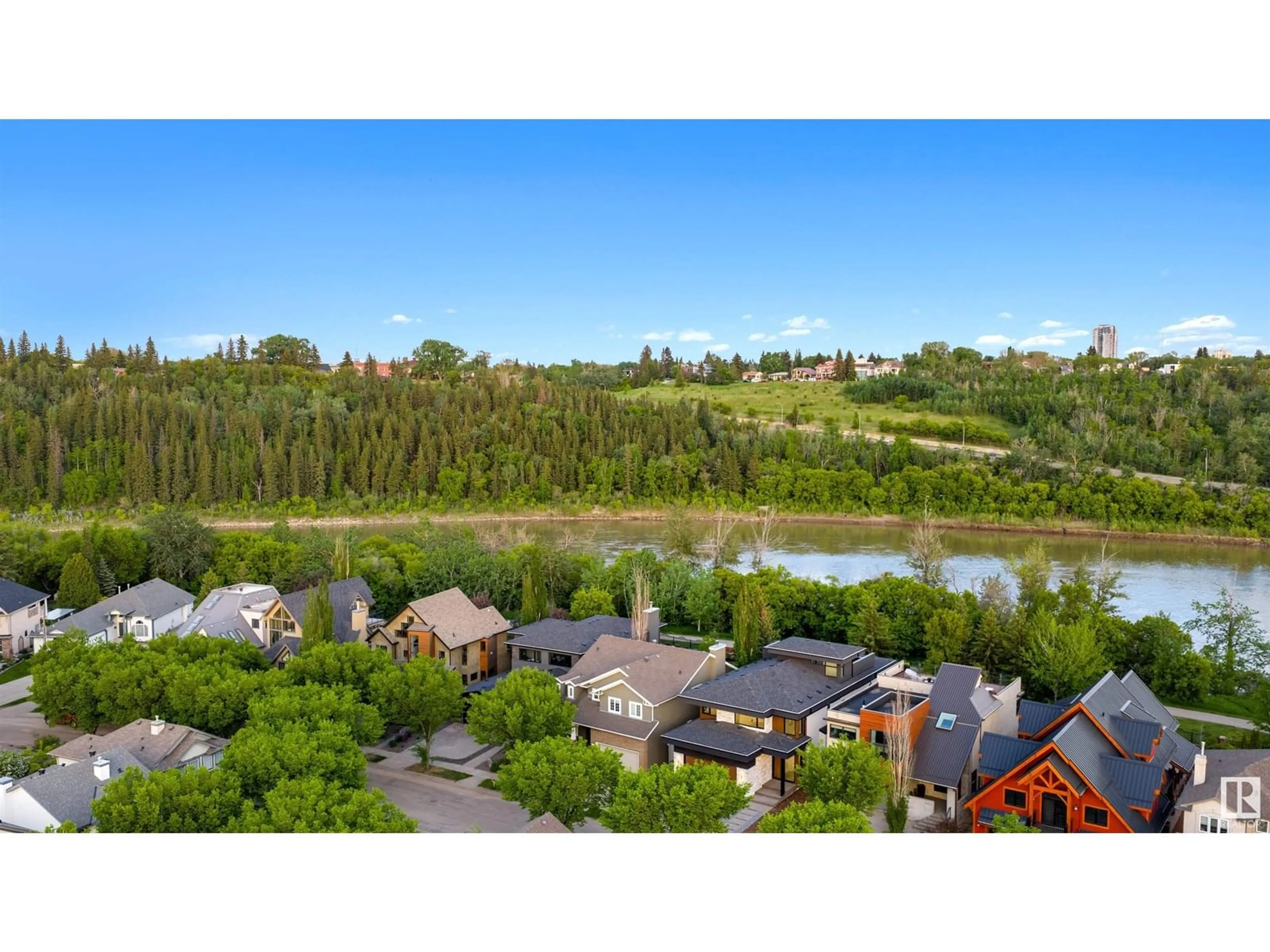 A pic from outside/outdoor area/front of a property/back of a property/a pic from drone, water/lake/river/ocean view for 8807 99 AV, Edmonton Alberta T5H4N5