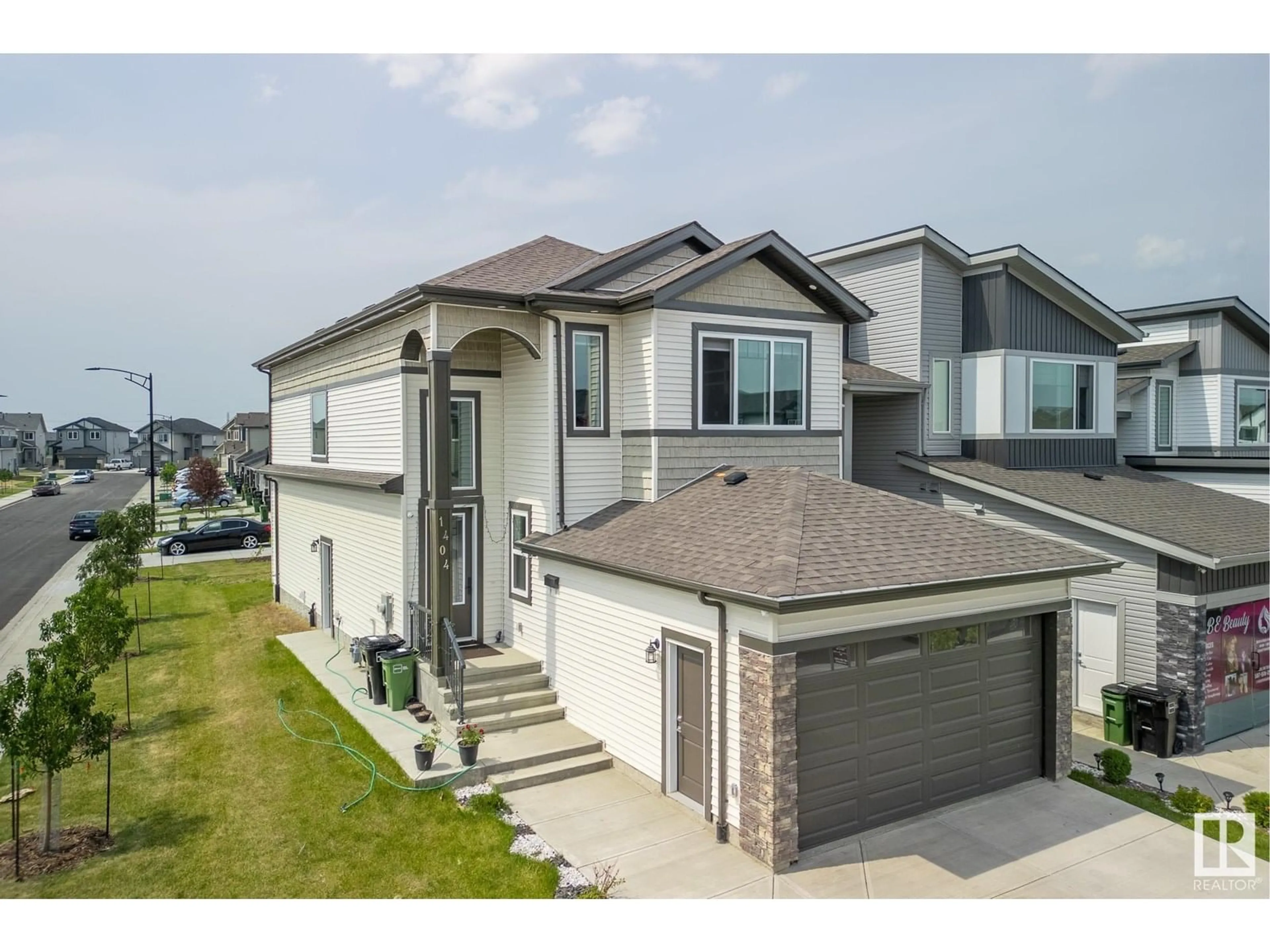 A pic from outside/outdoor area/front of a property/back of a property/a pic from drone, street for NW - 1404 15 ST, Edmonton Alberta T6T2S3