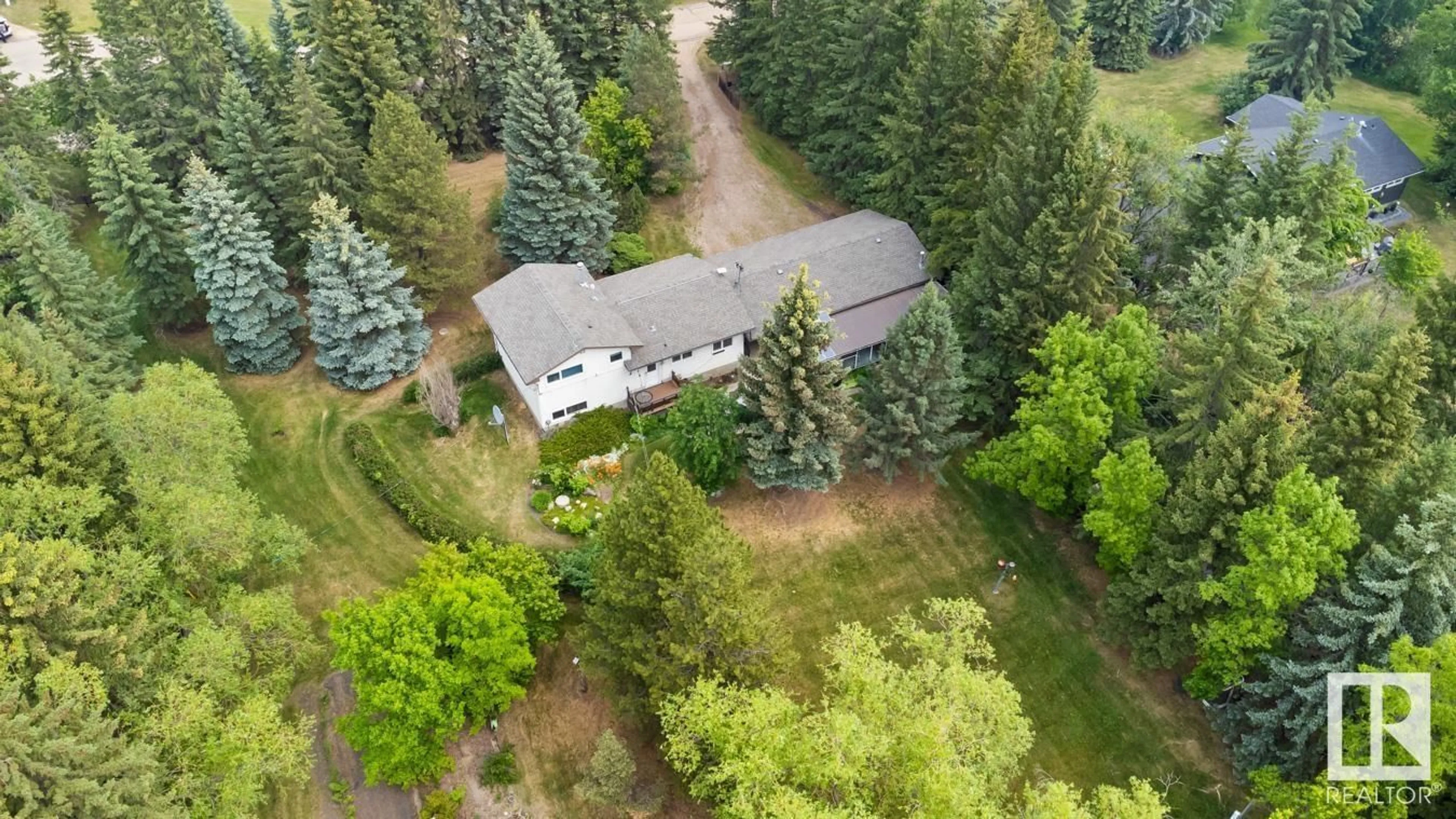 A pic from outside/outdoor area/front of a property/back of a property/a pic from drone, forest/trees view for 169 RGE ROAD 223, Rural Strathcona County Alberta T8C1B3