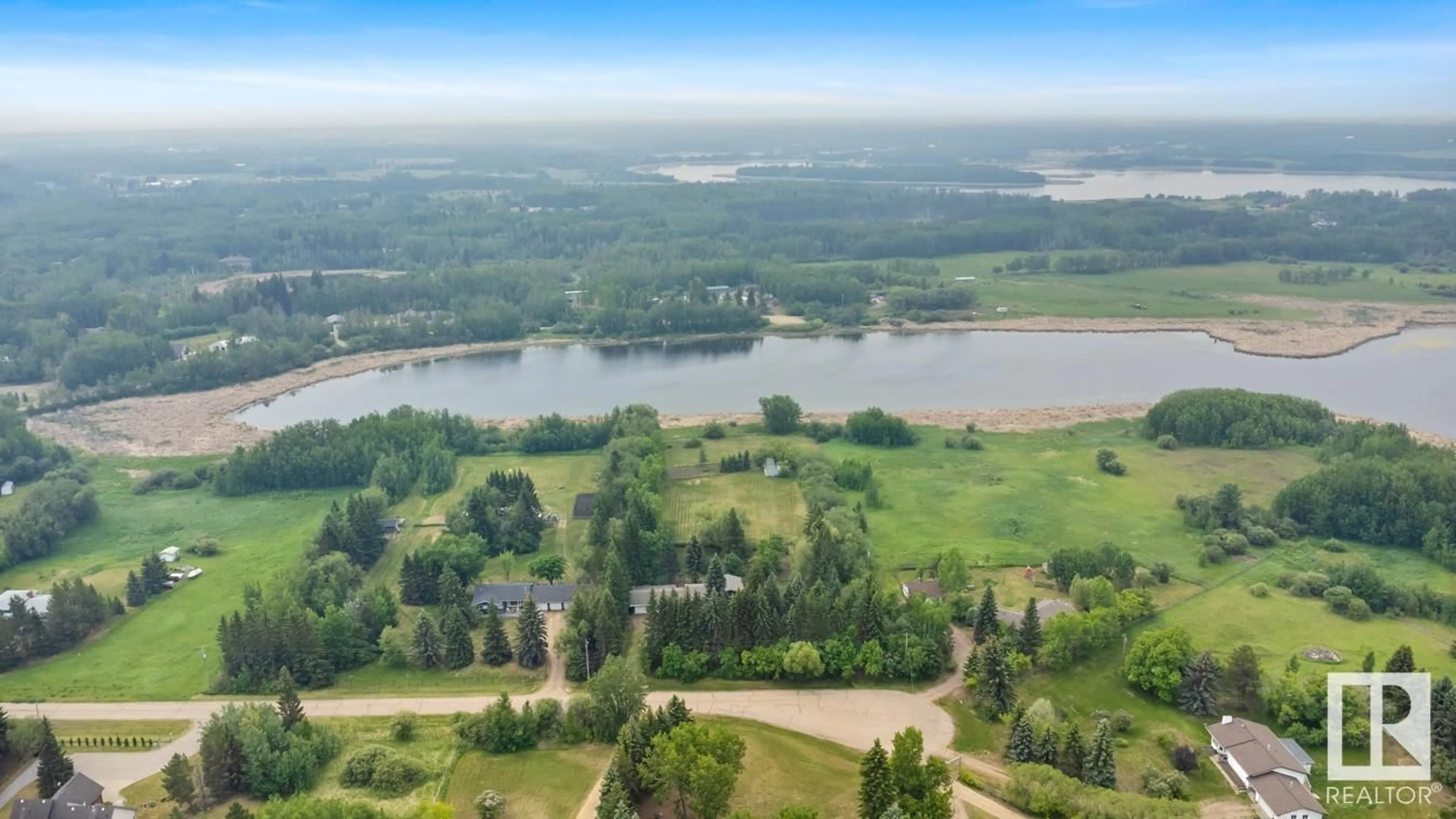 A pic from outside/outdoor area/front of a property/back of a property/a pic from drone, water/lake/river/ocean view for 169 RGE ROAD 223, Rural Strathcona County Alberta T8C1B3