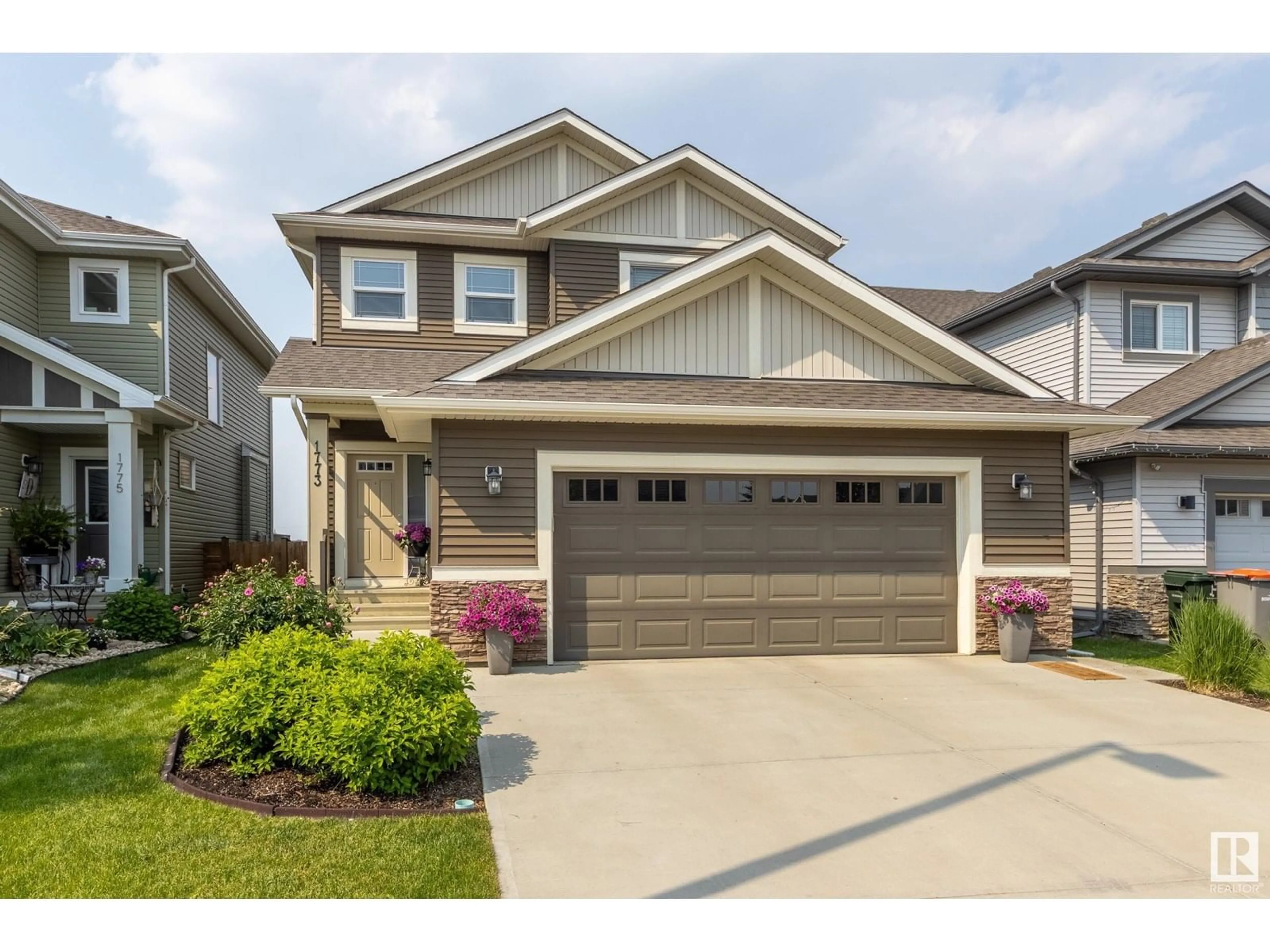 Home with vinyl exterior material, street for 1773 WESTERRA LO, Stony Plain Alberta T7Z0K9
