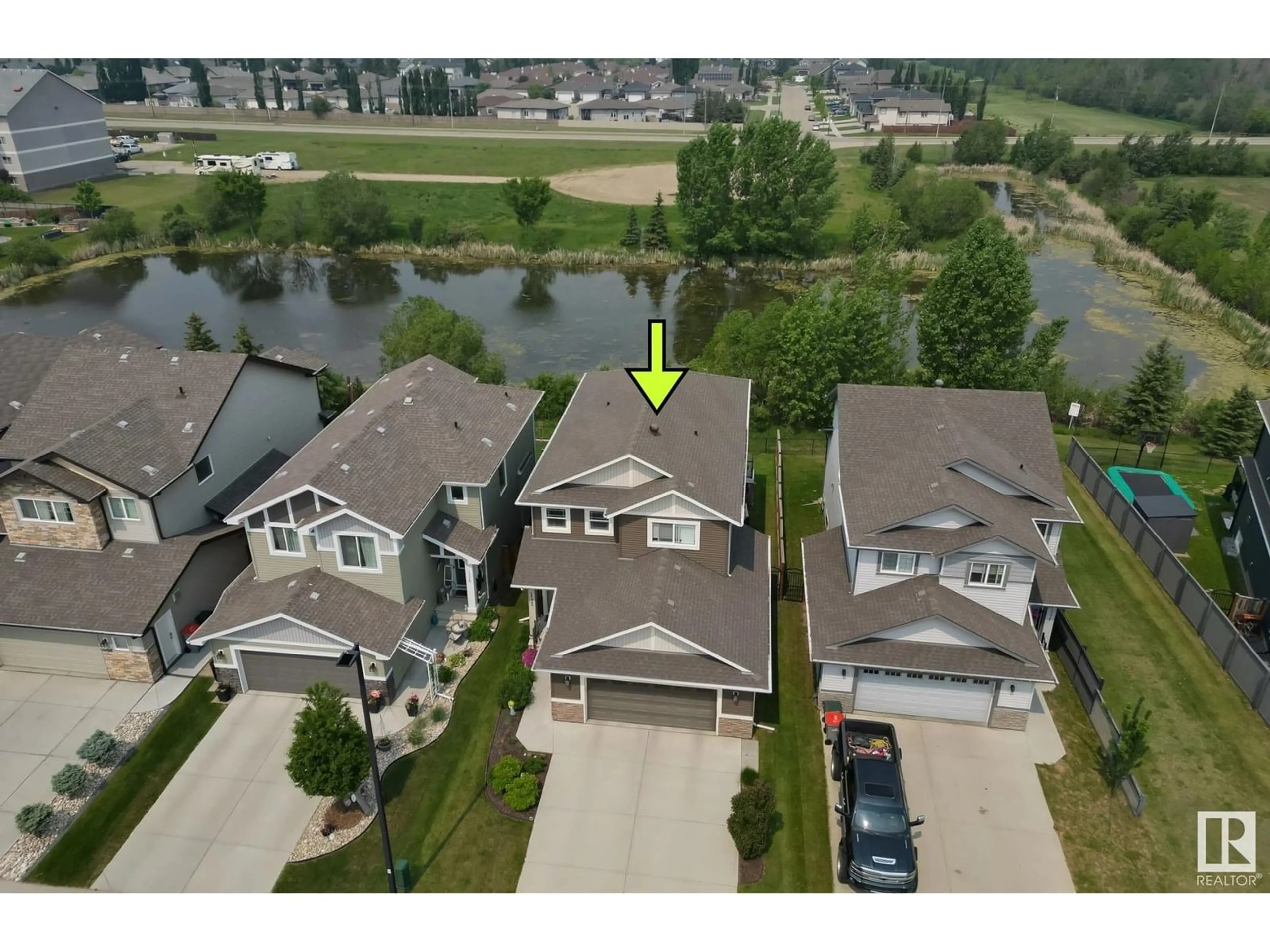 A pic from outside/outdoor area/front of a property/back of a property/a pic from drone, water/lake/river/ocean view for 1773 WESTERRA LO, Stony Plain Alberta T7Z0K9