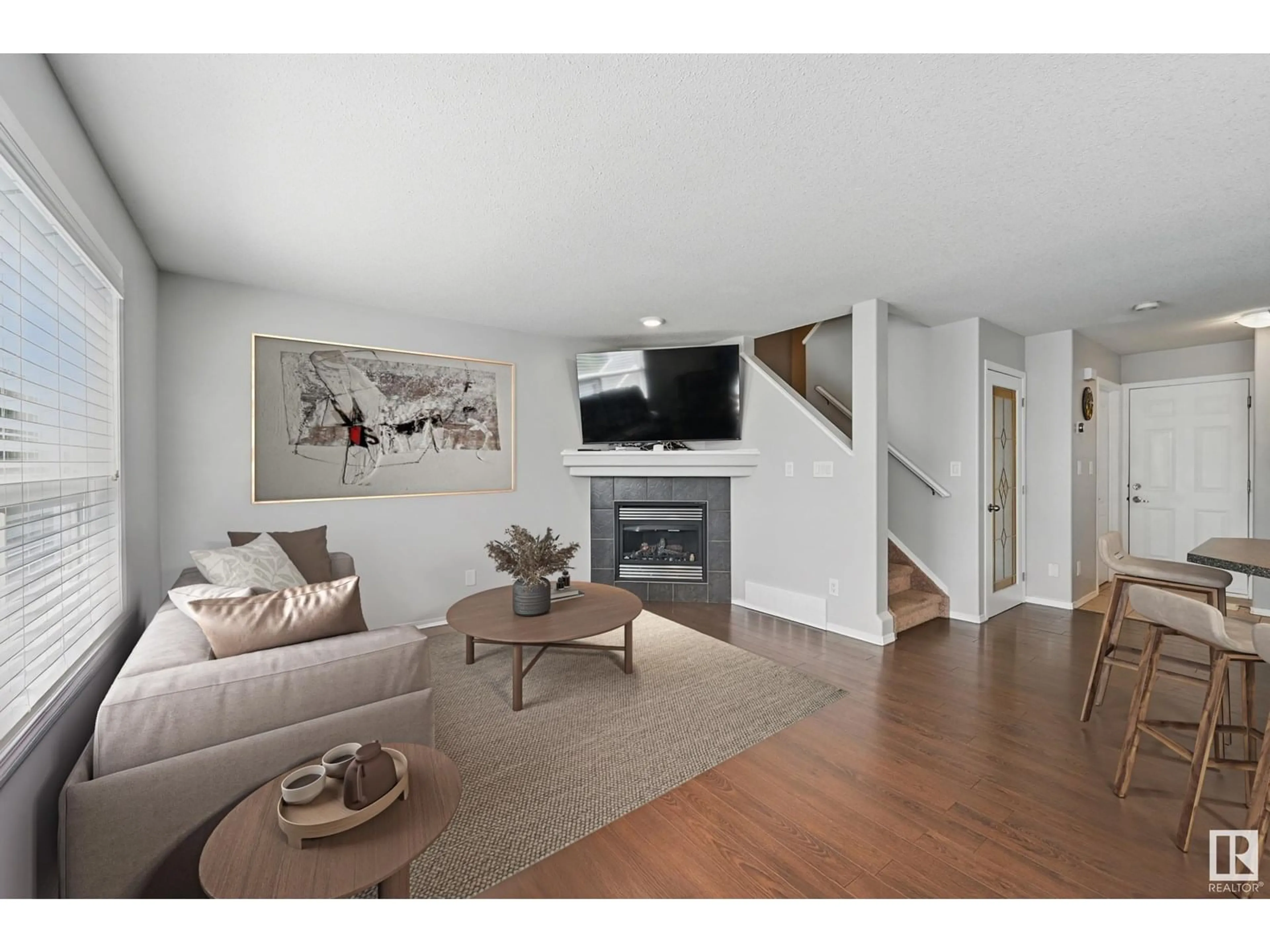 Living room with furniture, wood/laminate floor for 2 RED CANYON WY, Fort Saskatchewan Alberta T8L0E7