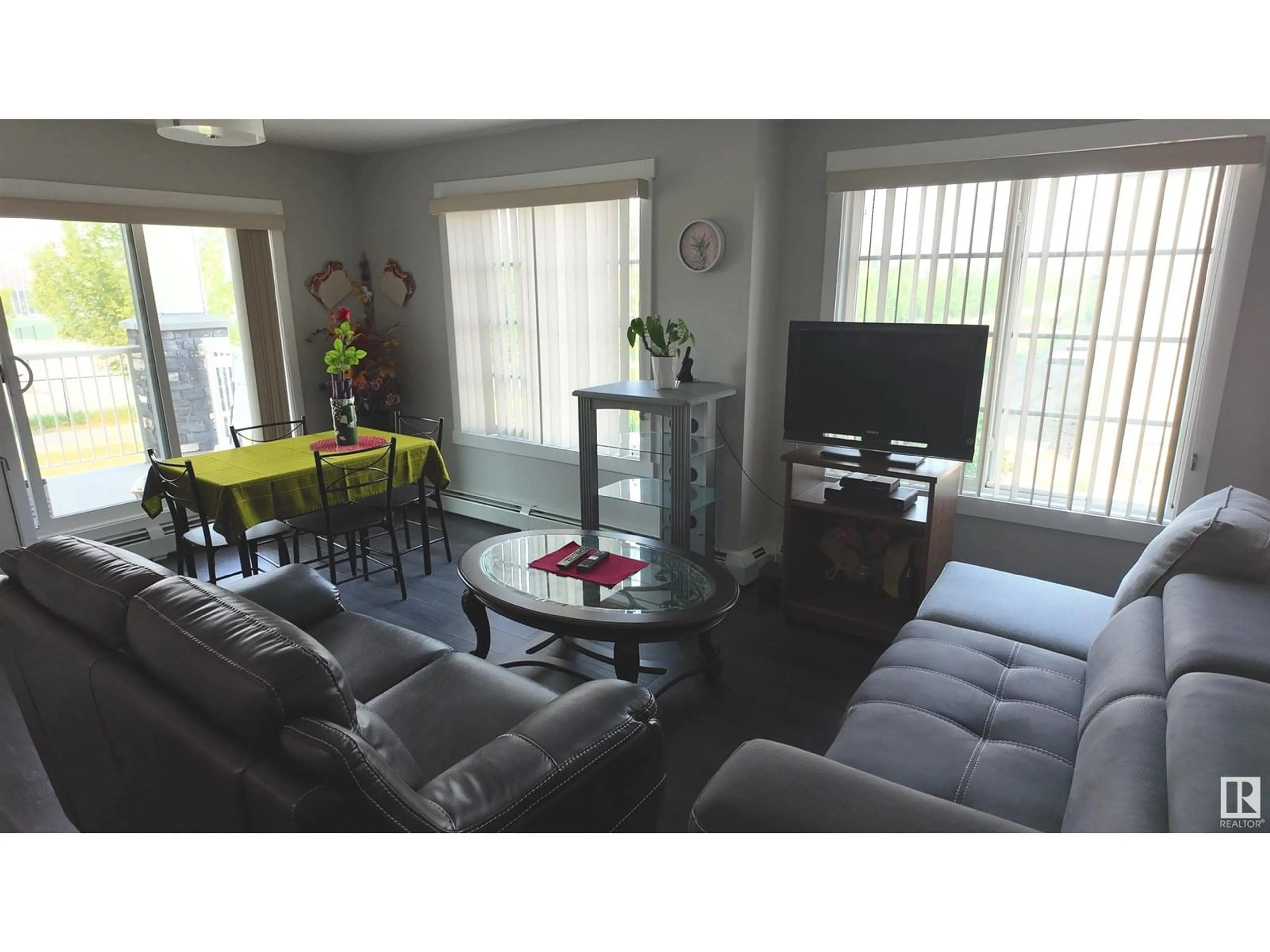 Living room with furniture, unknown for 206 - 3670 139 AV, Edmonton Alberta T5Y3N5