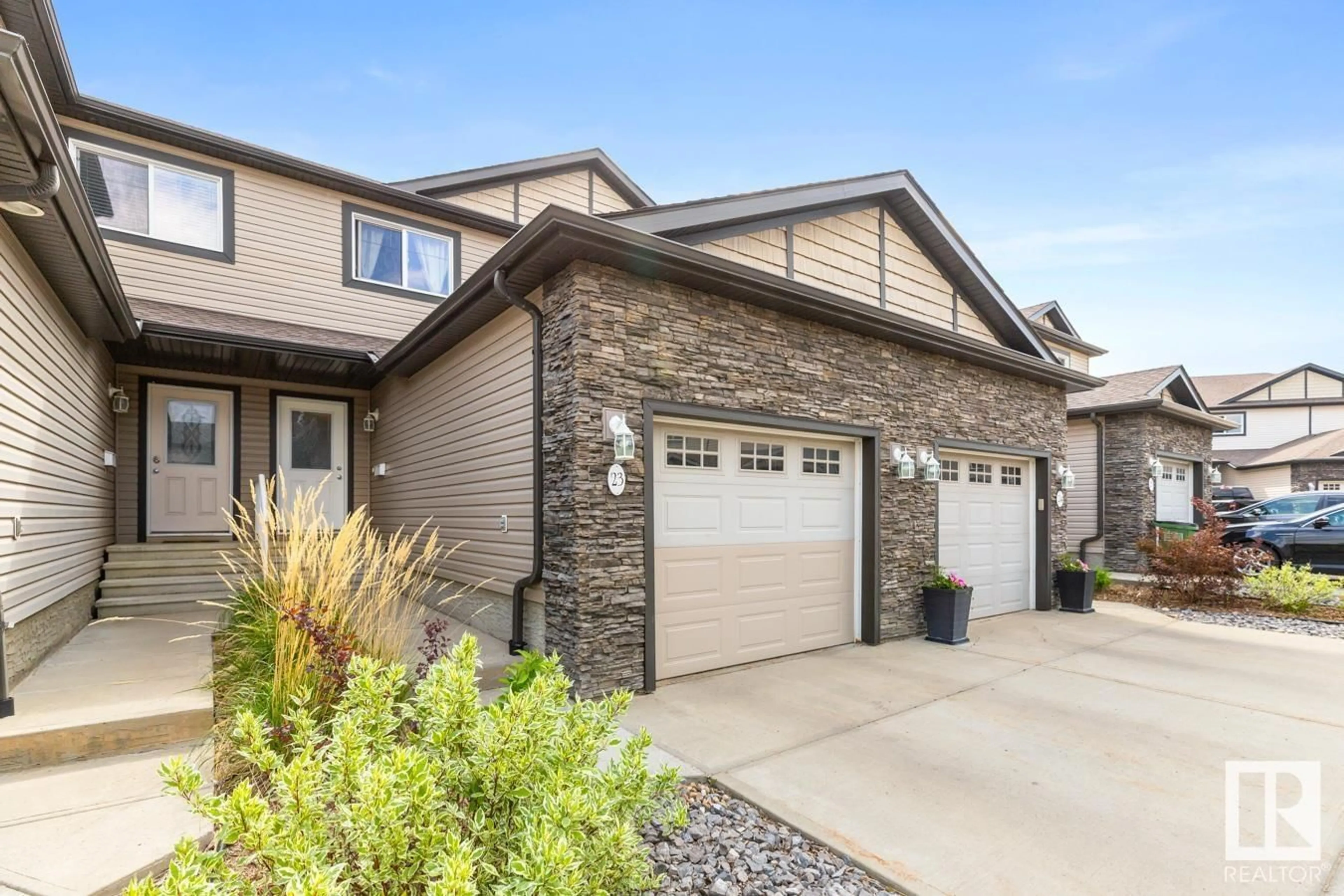 Home with brick exterior material, street for 23 - 2005 70 ST, Edmonton Alberta T6X0T9