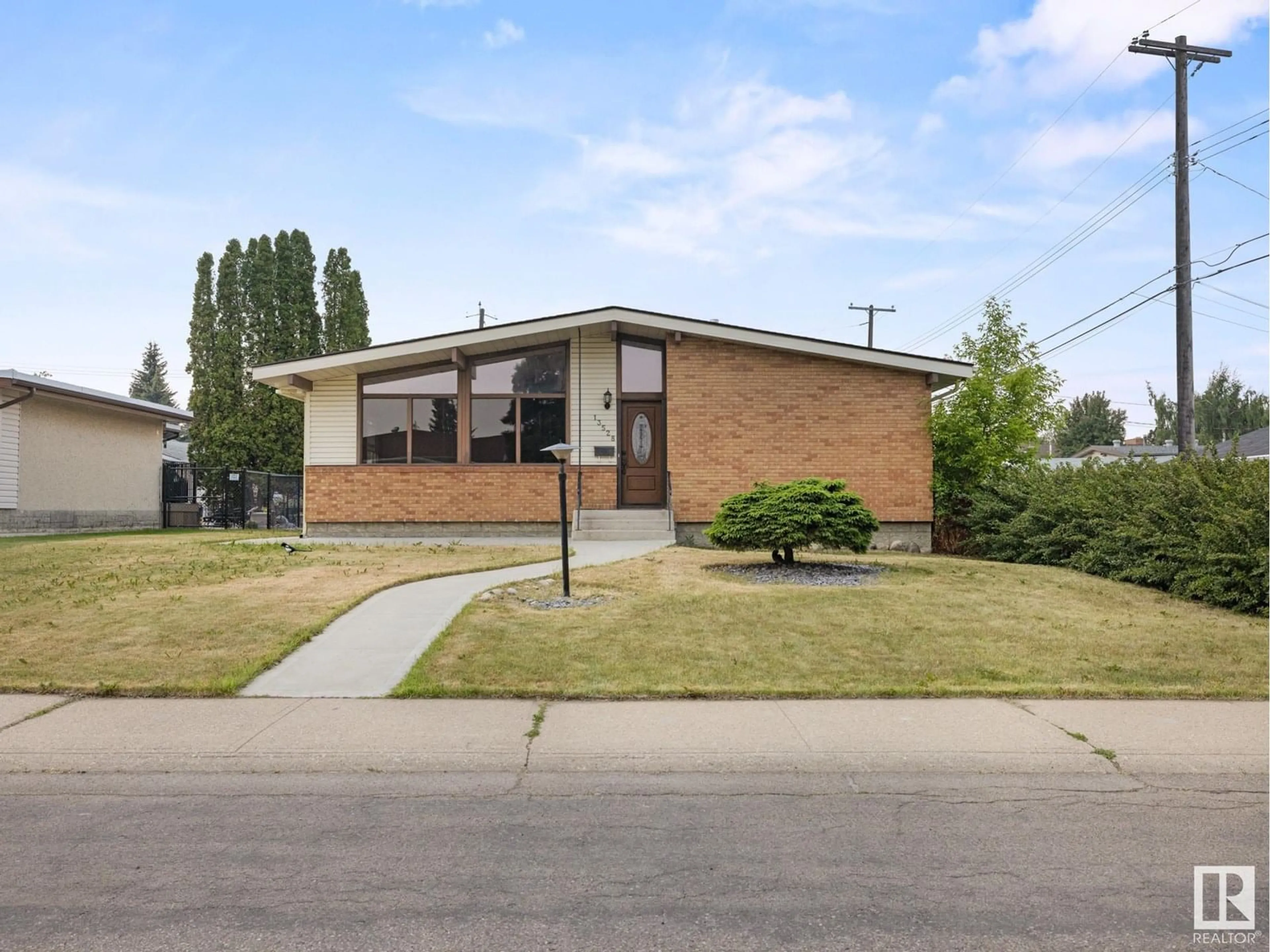 Home with brick exterior material, street for NW - 13528 85A ST, Edmonton Alberta T5E3A5
