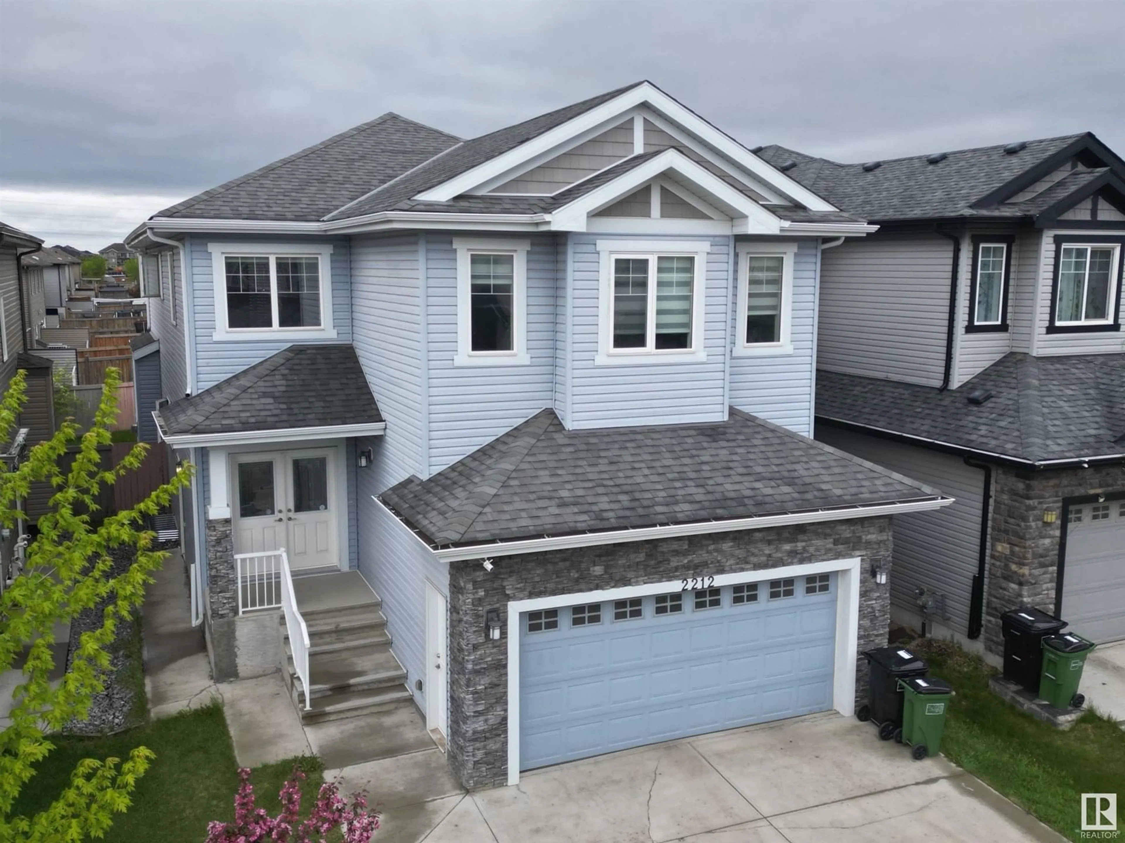 A pic from outside/outdoor area/front of a property/back of a property/a pic from drone, street for 2212 22 ST, Edmonton Alberta T6T0Z1