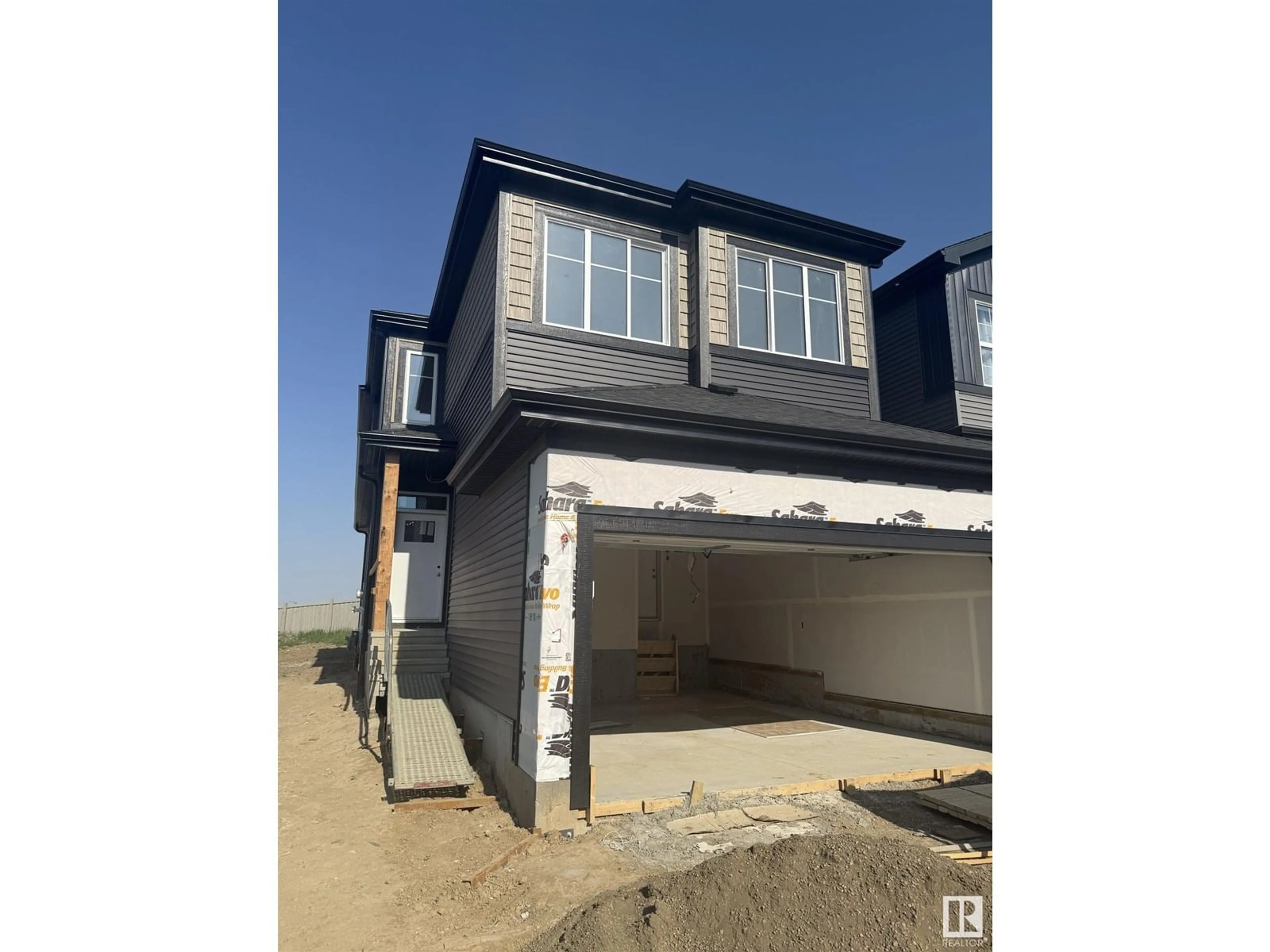 A pic from outside/outdoor area/front of a property/back of a property/a pic from drone, street for 282 RANCHER RD, Ardrossan Alberta T8E0B6