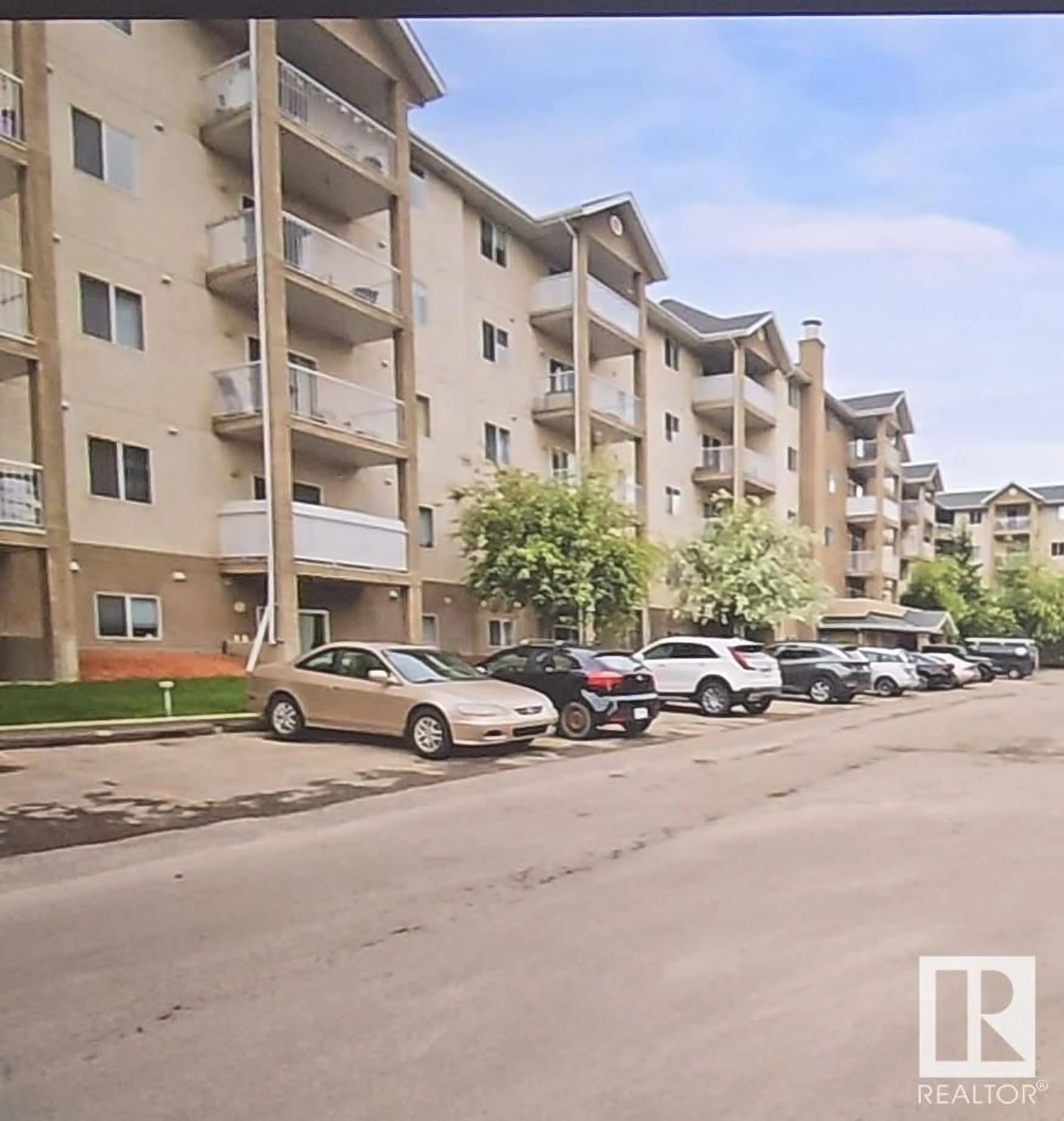 A pic from outside/outdoor area/front of a property/back of a property/a pic from drone, street for #103 - 10535 122 ST, Edmonton Alberta T5N4B7