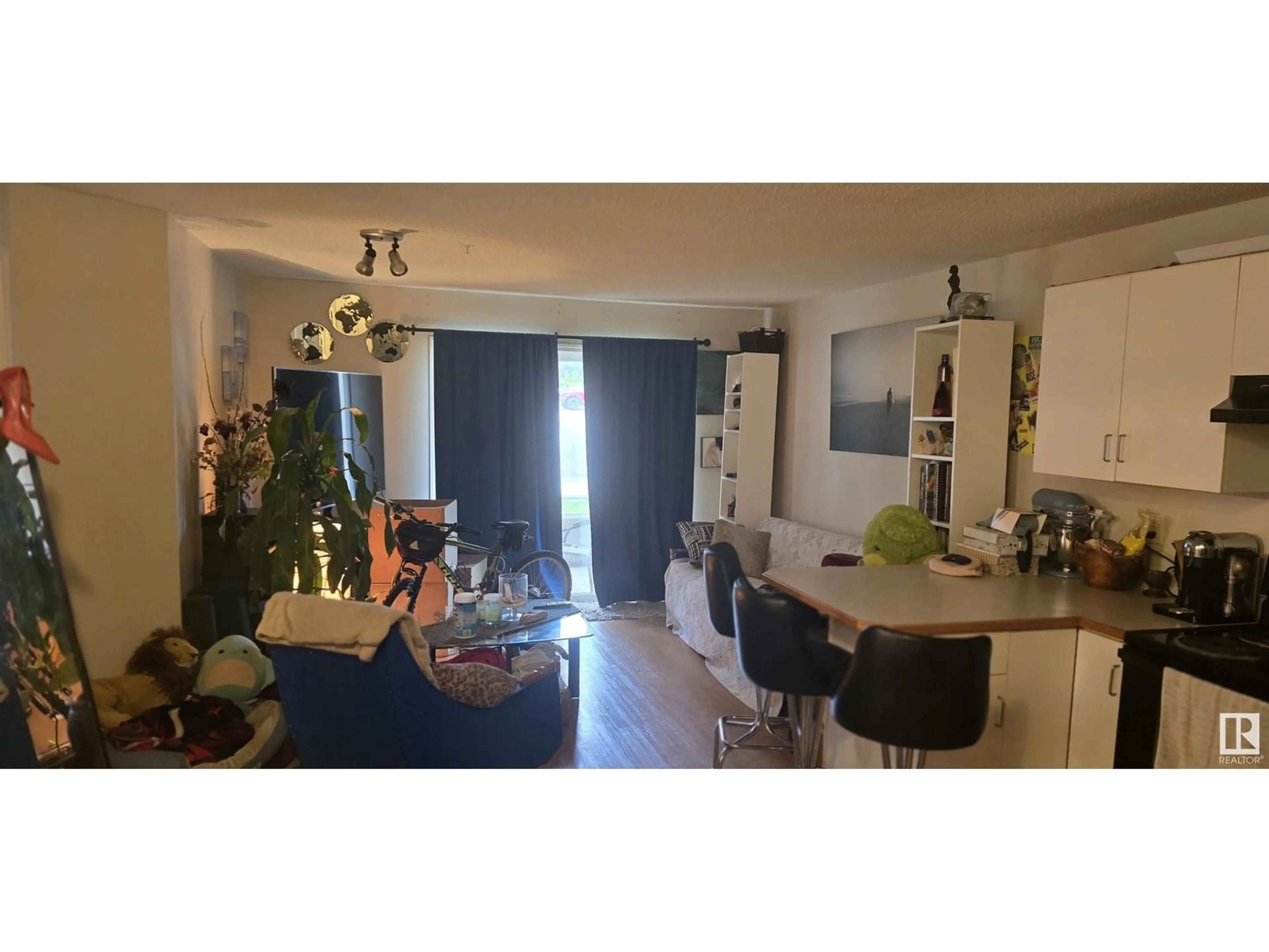 Living room with furniture, wood/laminate floor for #103 - 10535 122 ST, Edmonton Alberta T5N4B7