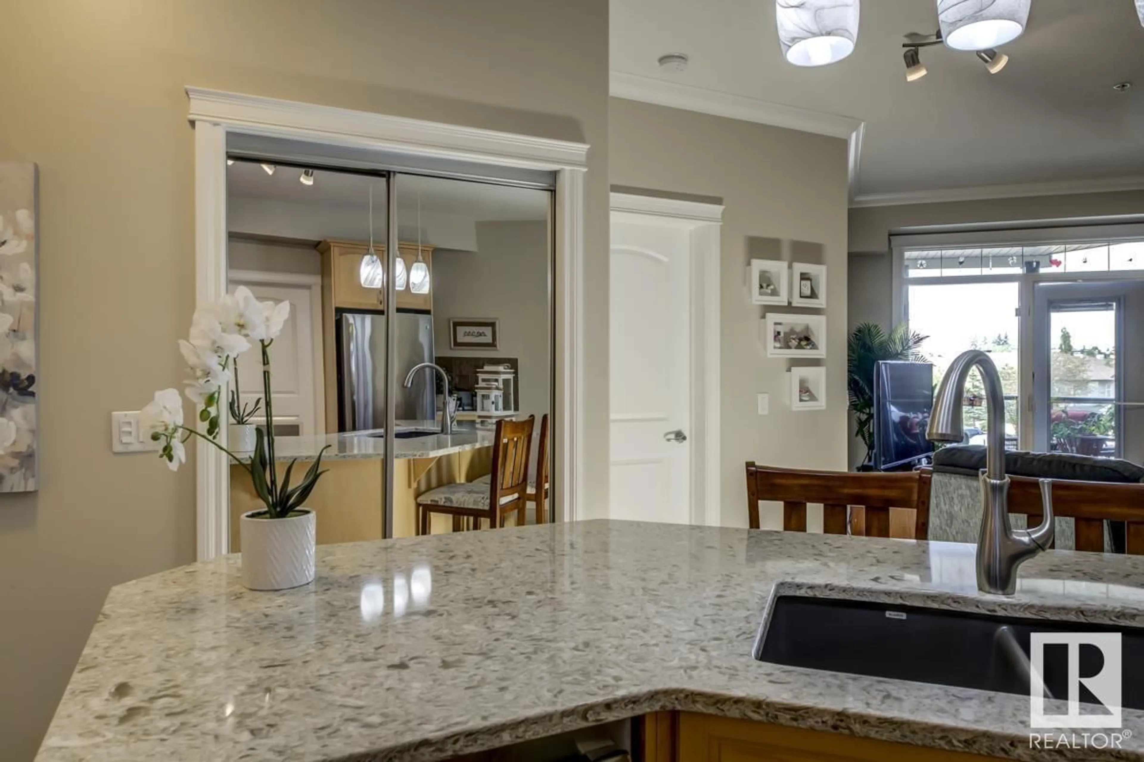 Open concept kitchen, ceramic/tile floor for 203 - 12408 15 AV, Edmonton Alberta T6W1X2