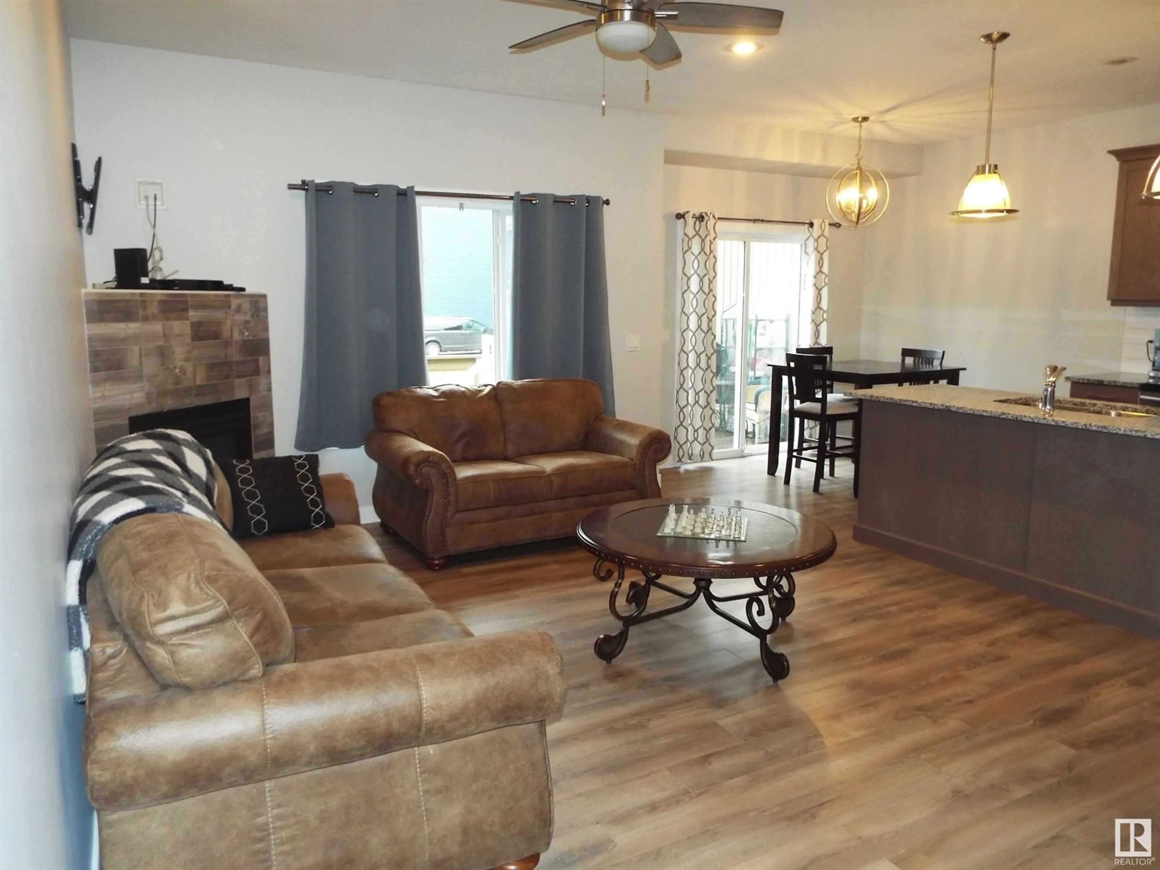 Living room with furniture, unknown for #108 - 300 AWENTIA DR, Leduc Alberta T9E2X2