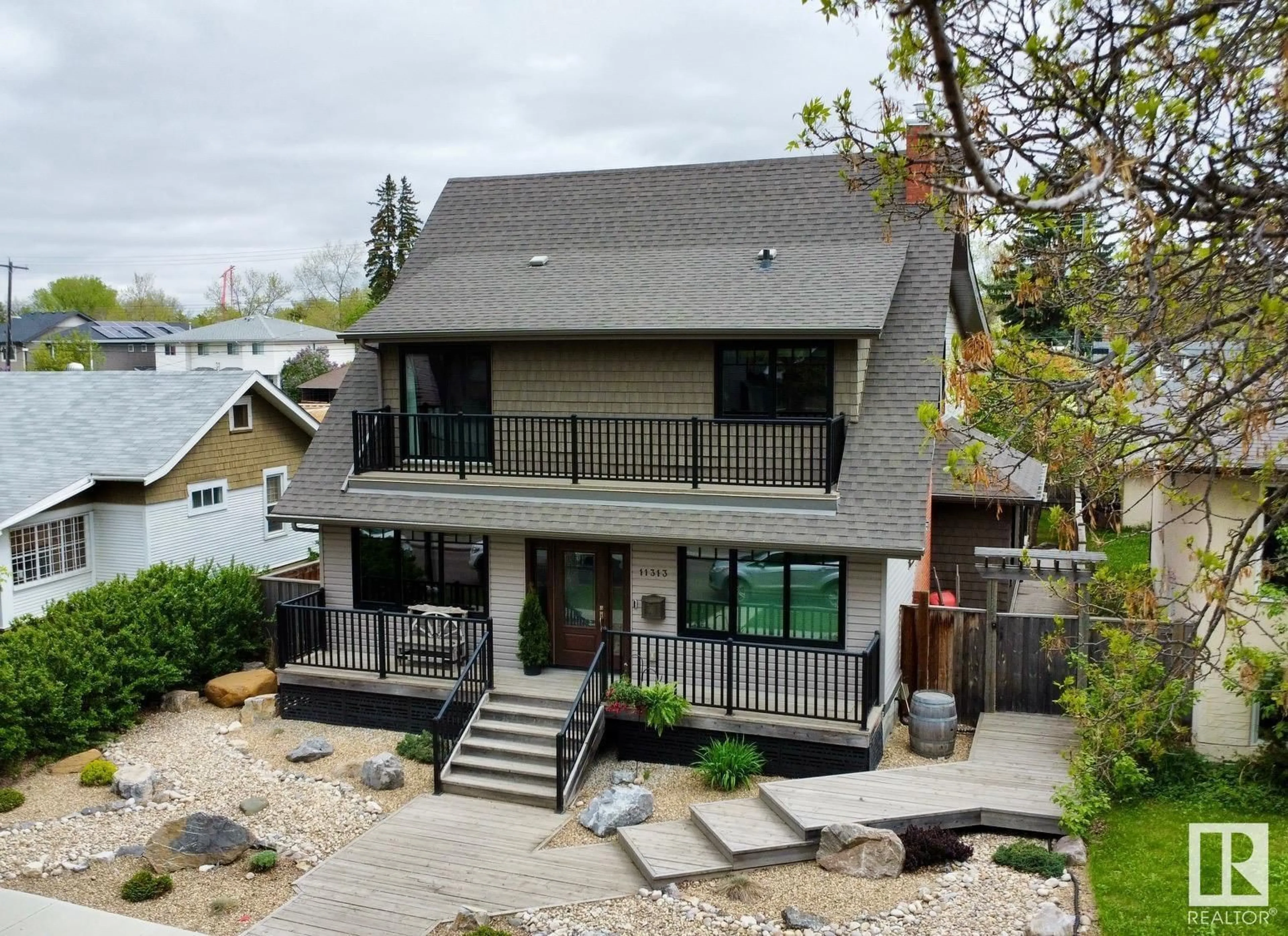 A pic from outside/outdoor area/front of a property/back of a property/a pic from drone, water/lake/river/ocean view for 11313 127 ST, Edmonton Alberta T5M0T9