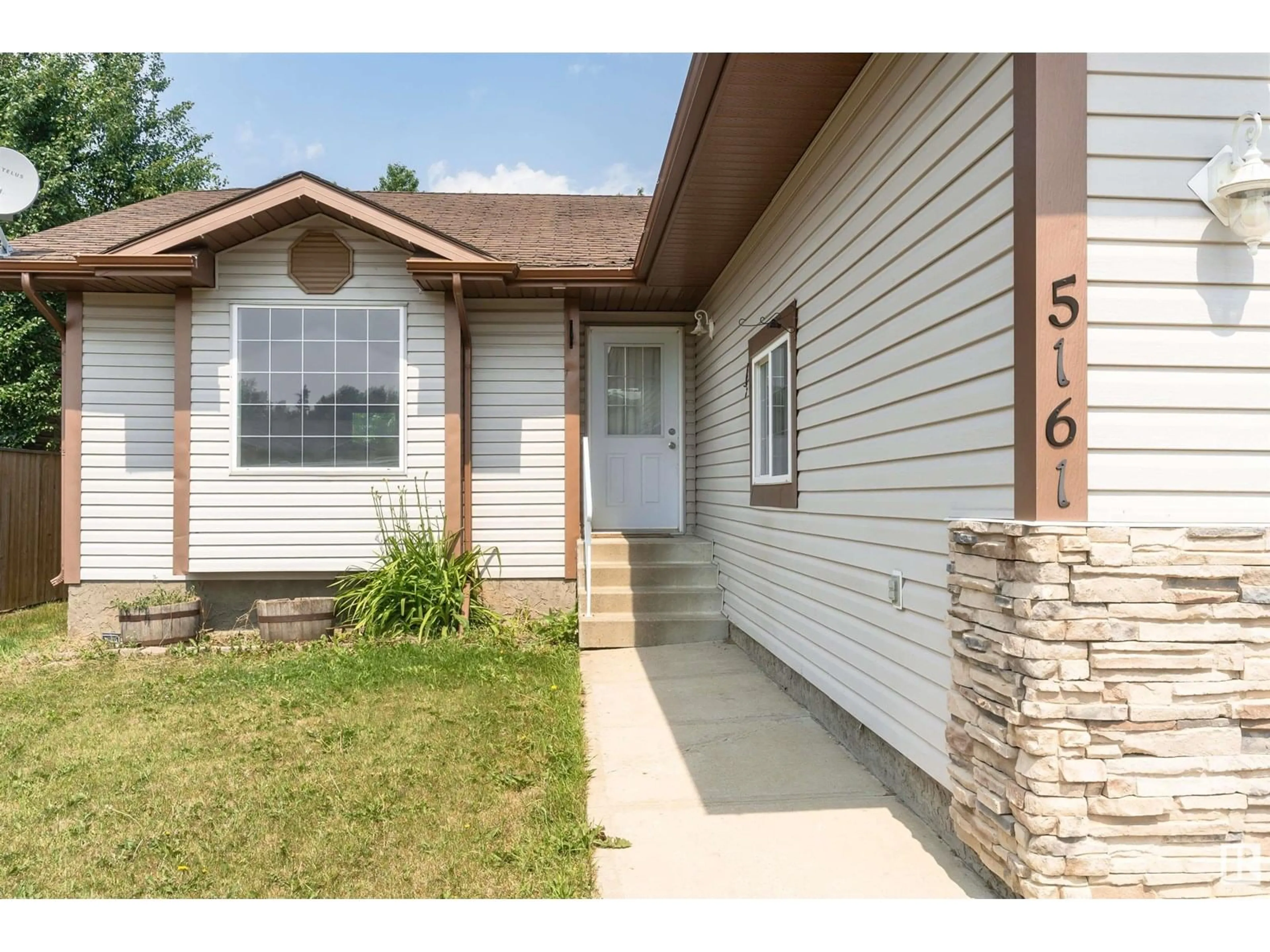 Home with vinyl exterior material, street for 5161 54 AV, Redwater Alberta T0A2W0