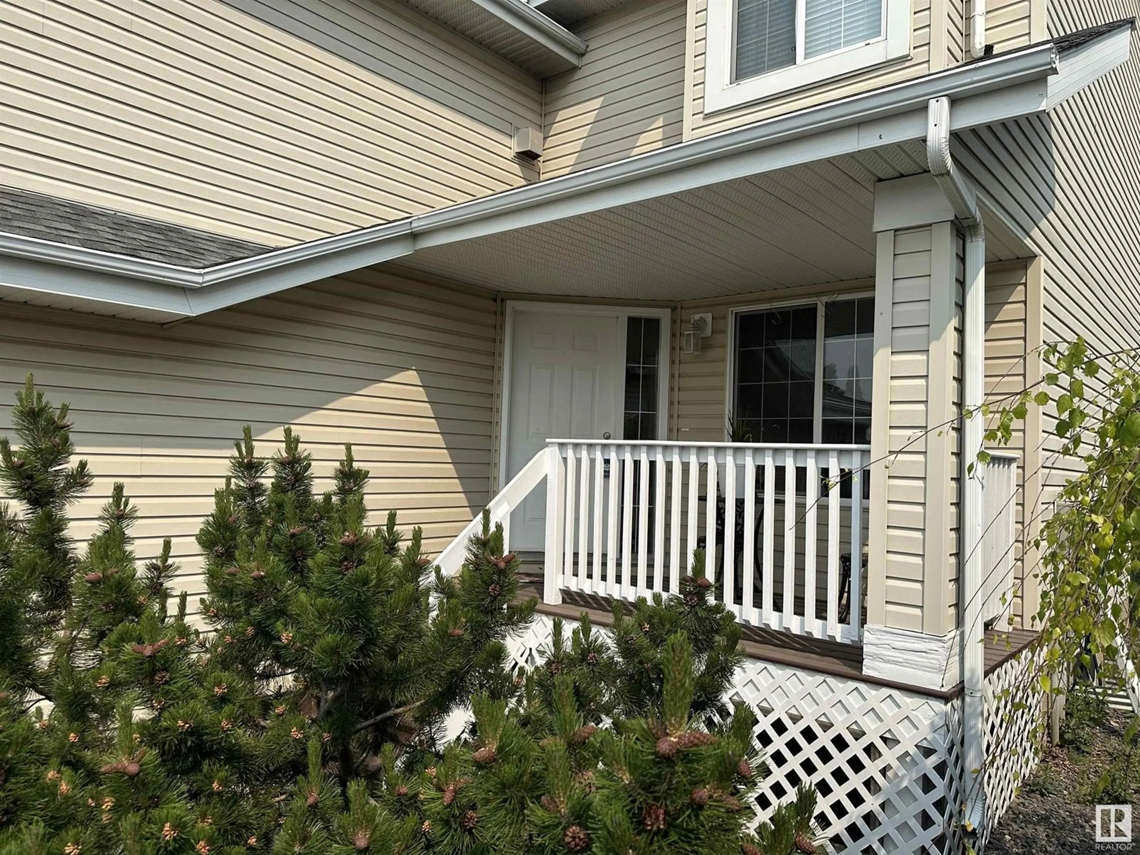 Home with vinyl exterior material, street for 523 HUNTERS GR, Edmonton Alberta T6R3B6