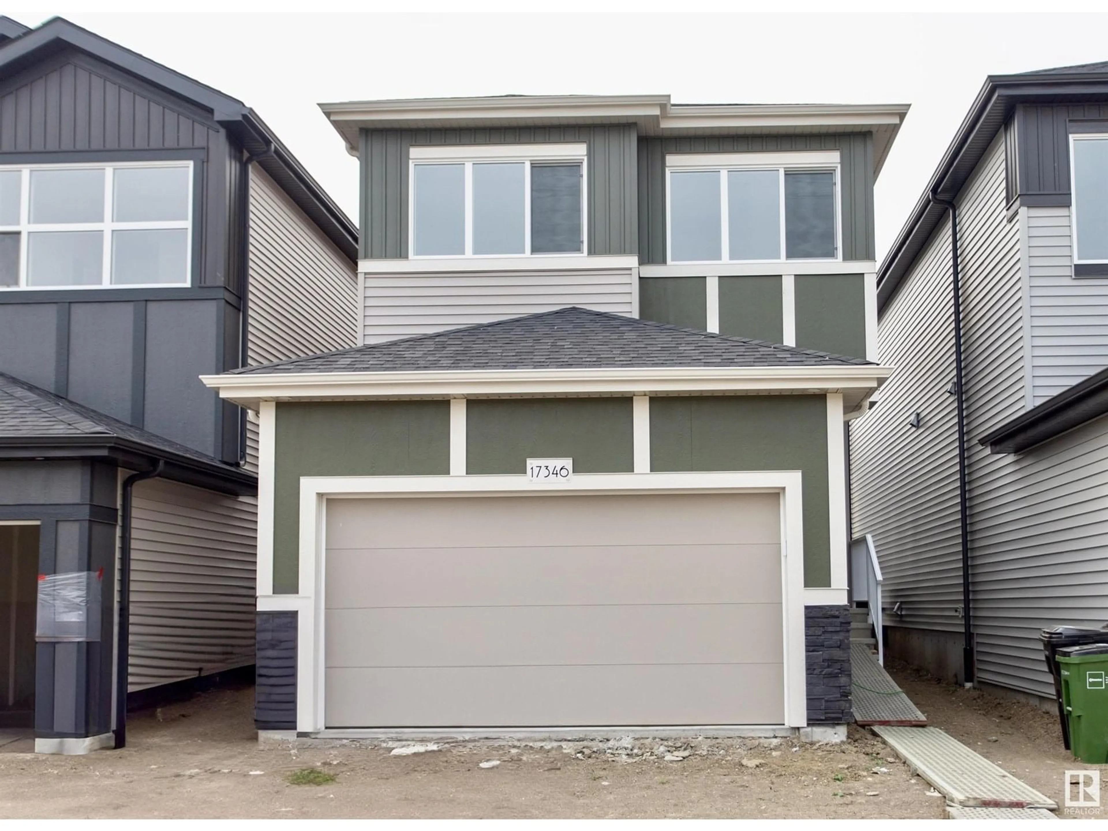 Home with vinyl exterior material, street for 22919 80 AVENUE NW, Edmonton Alberta T5T7Y1