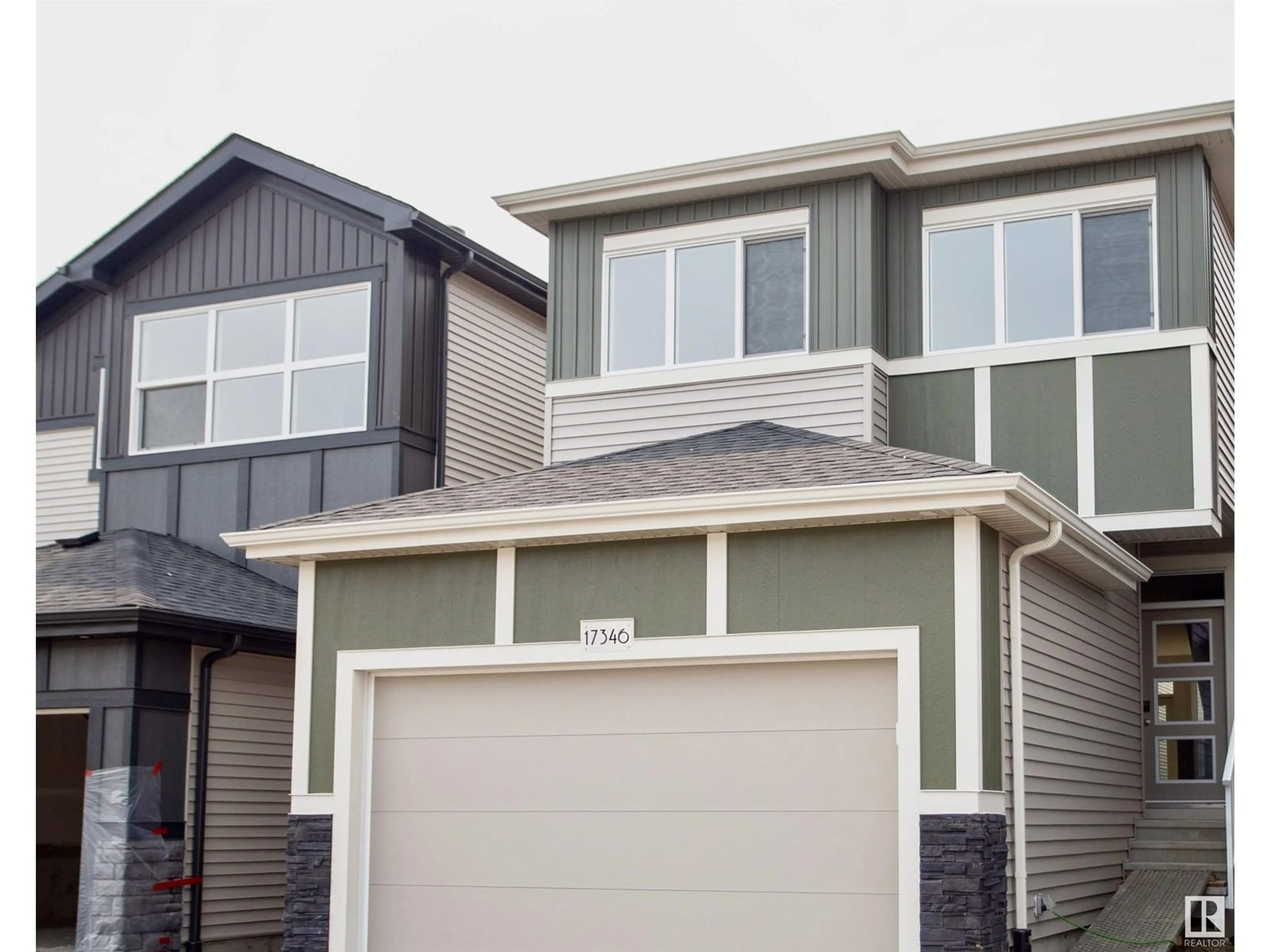 Home with vinyl exterior material, street for 22919 80 AVENUE NW, Edmonton Alberta T5T7Y1