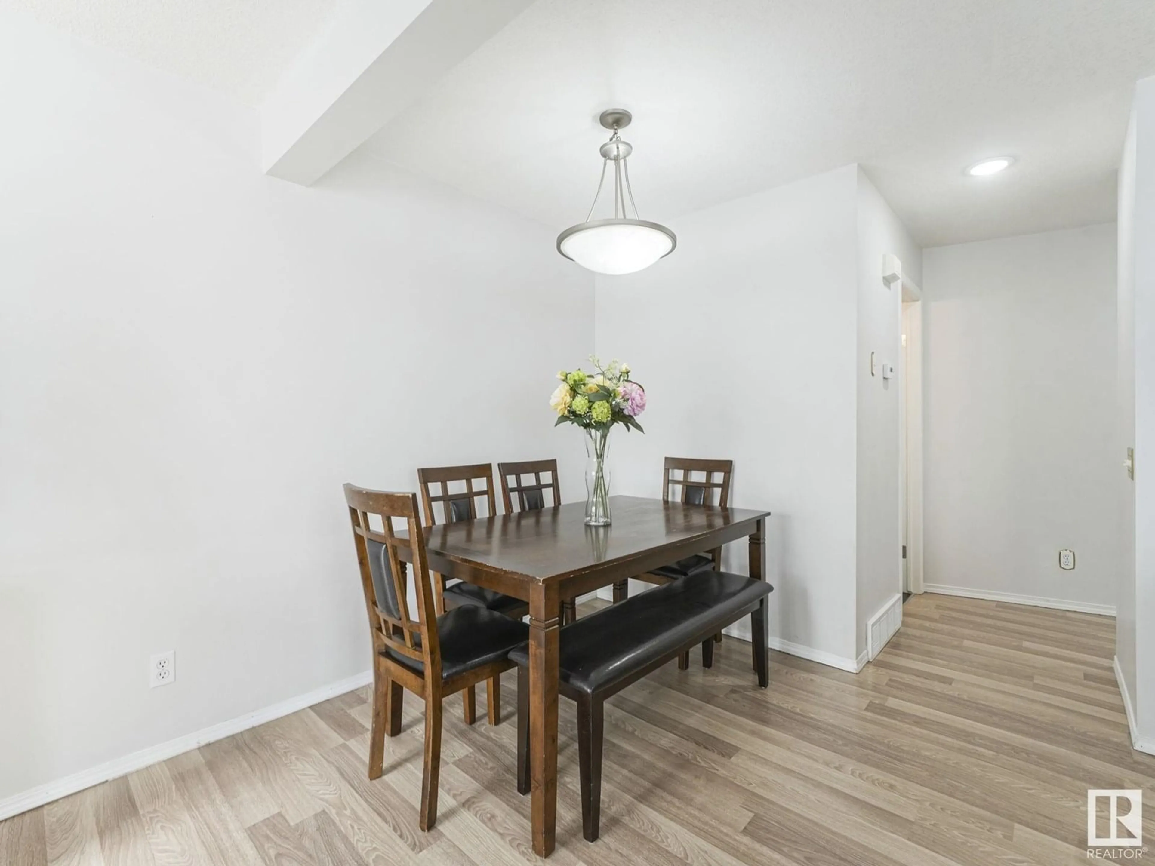 Dining room, wood/laminate floor for 230 - 183 EDWARDS DR, Edmonton Alberta T6X1G7