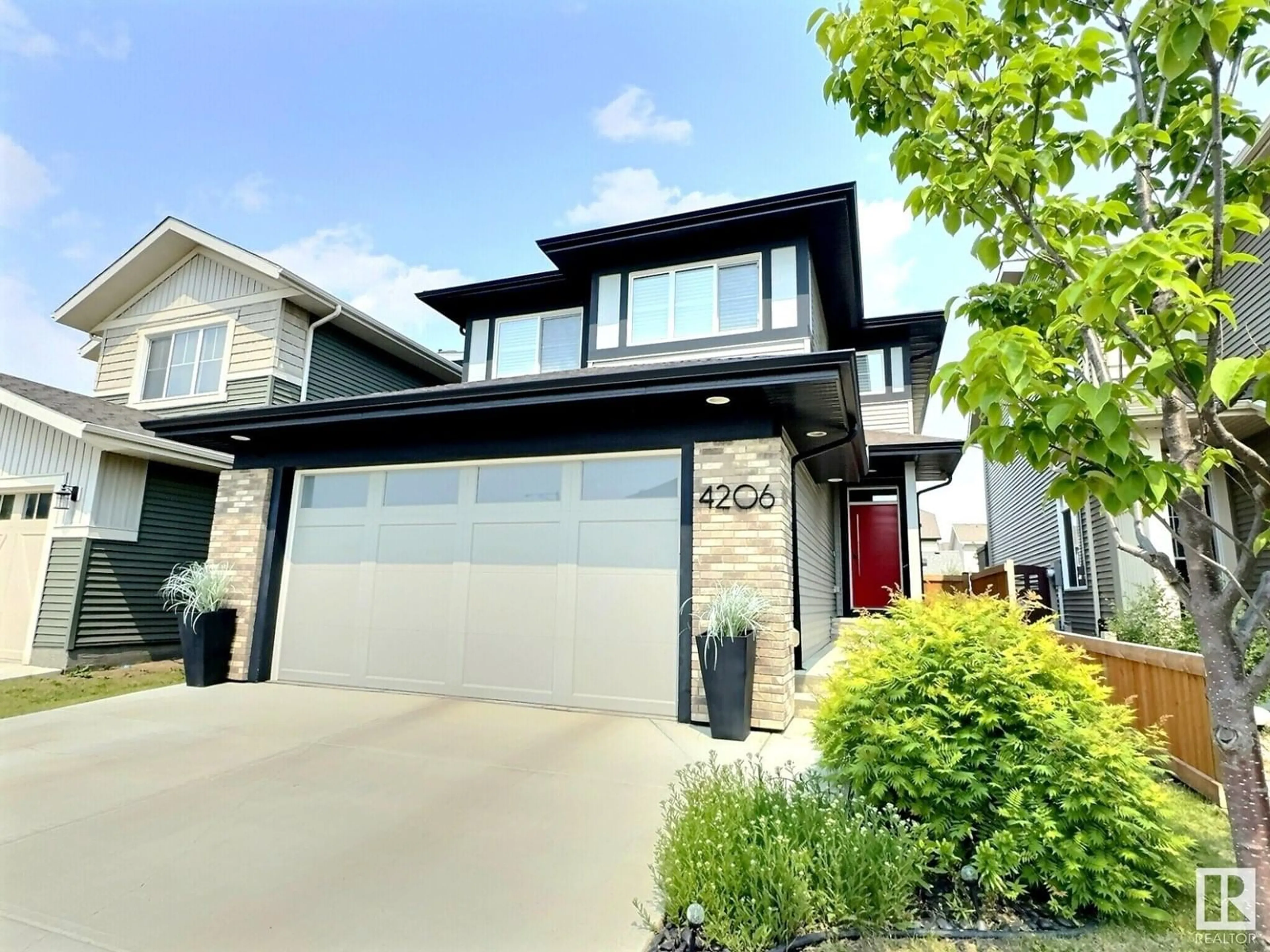 Home with vinyl exterior material, street for 4206 CHICHAK CL, Edmonton Alberta T6W4B3