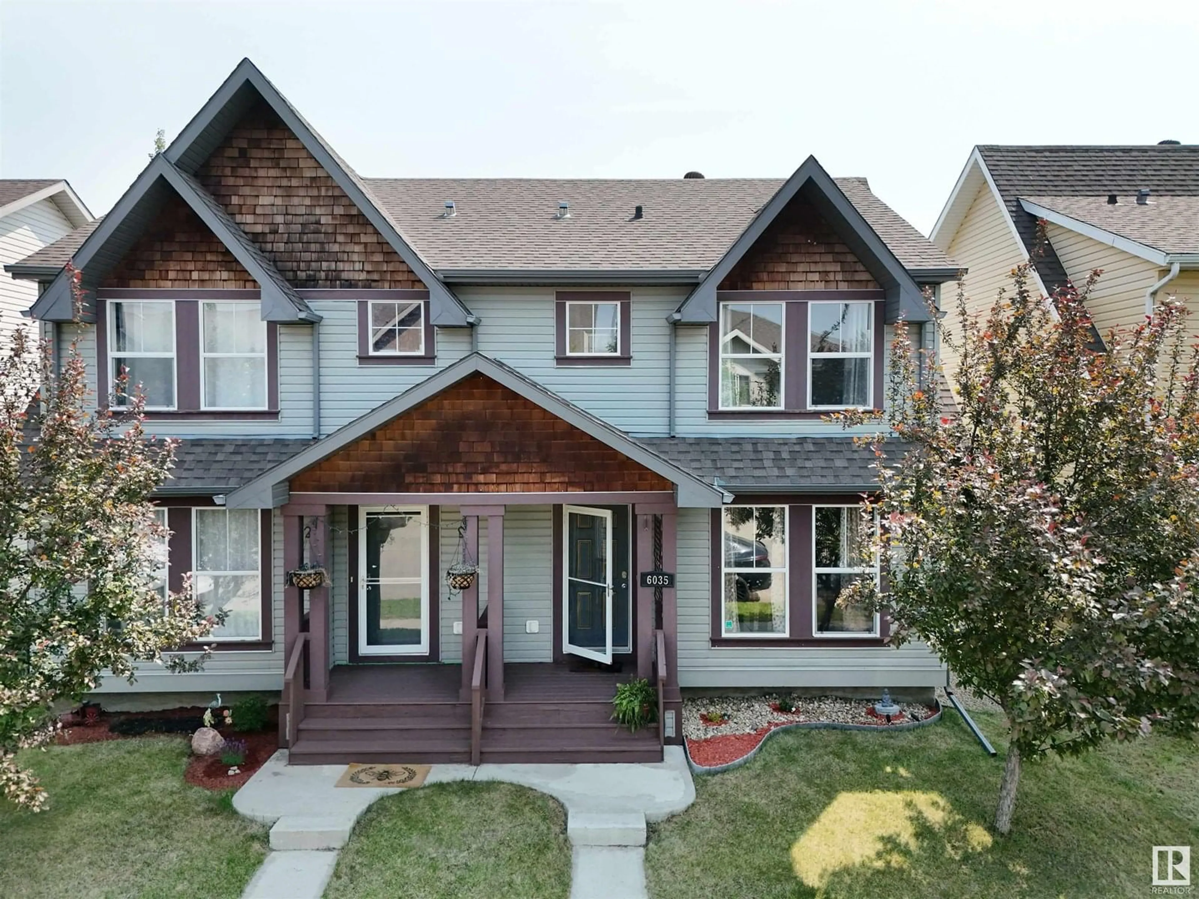 Home with brick exterior material, street for NW - 6035 214 ST, Edmonton Alberta T6M0H8