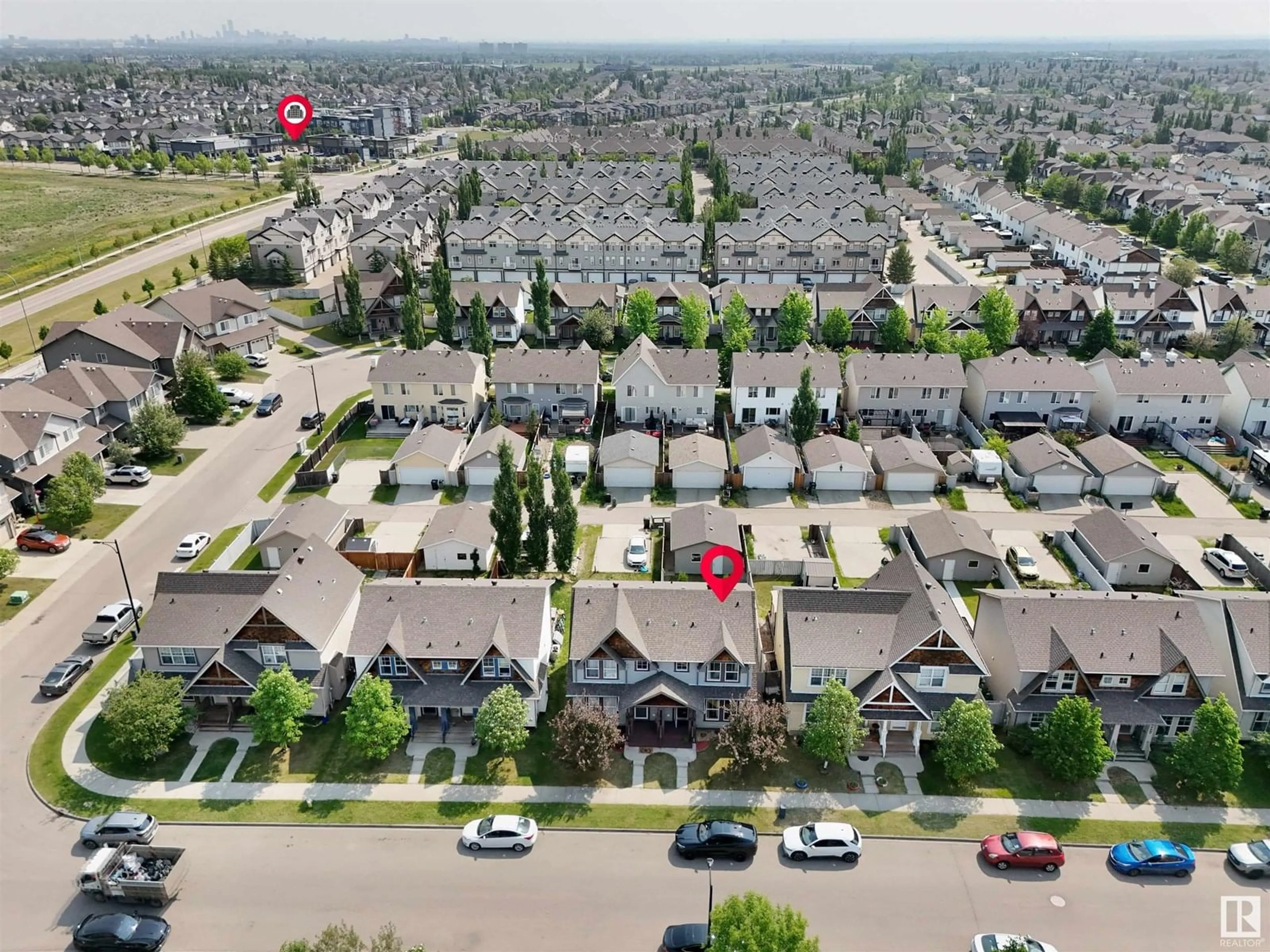 A pic from outside/outdoor area/front of a property/back of a property/a pic from drone, street for NW - 6035 214 ST, Edmonton Alberta T6M0H8