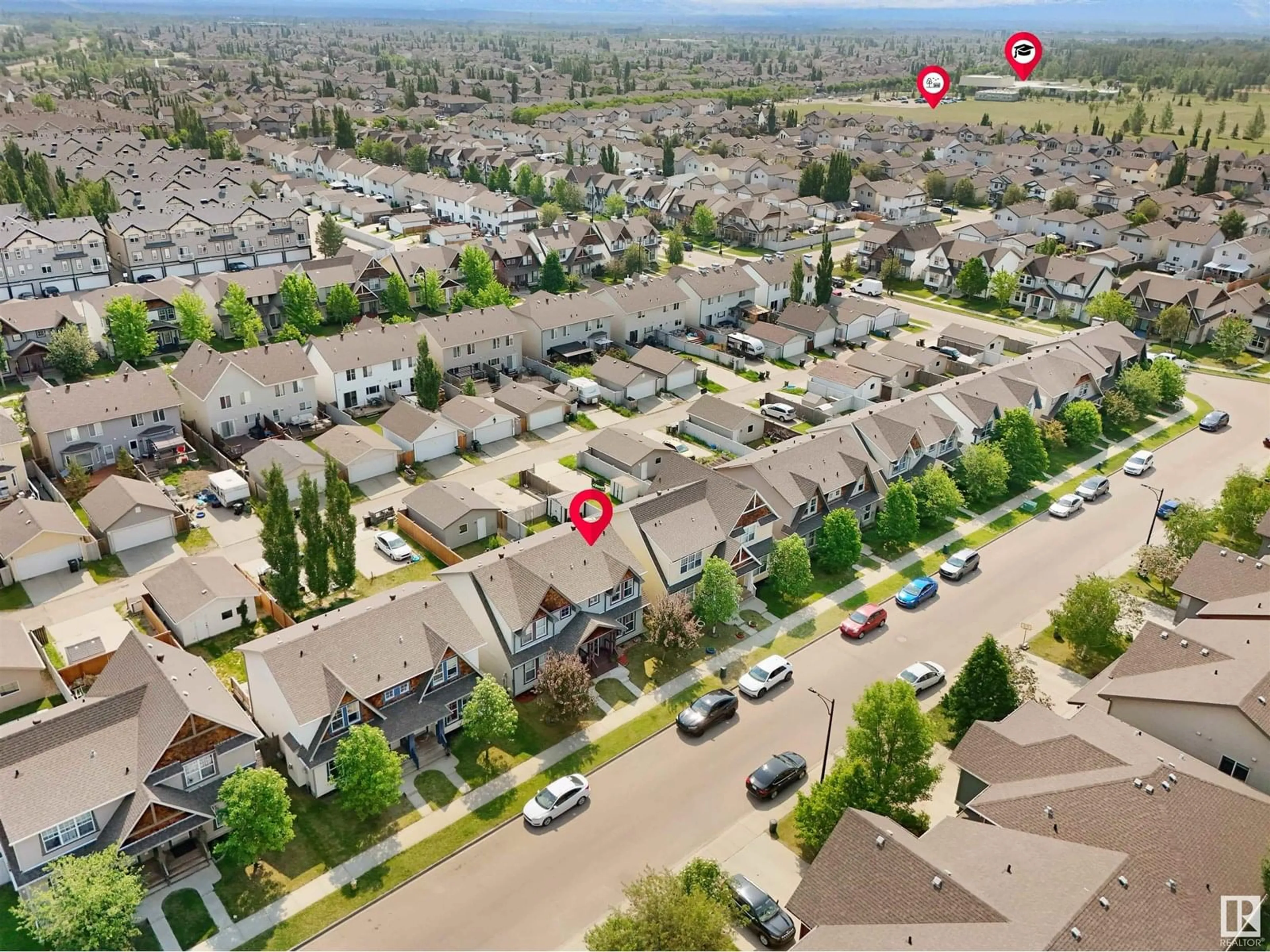 A pic from outside/outdoor area/front of a property/back of a property/a pic from drone, street for NW - 6035 214 ST, Edmonton Alberta T6M0H8