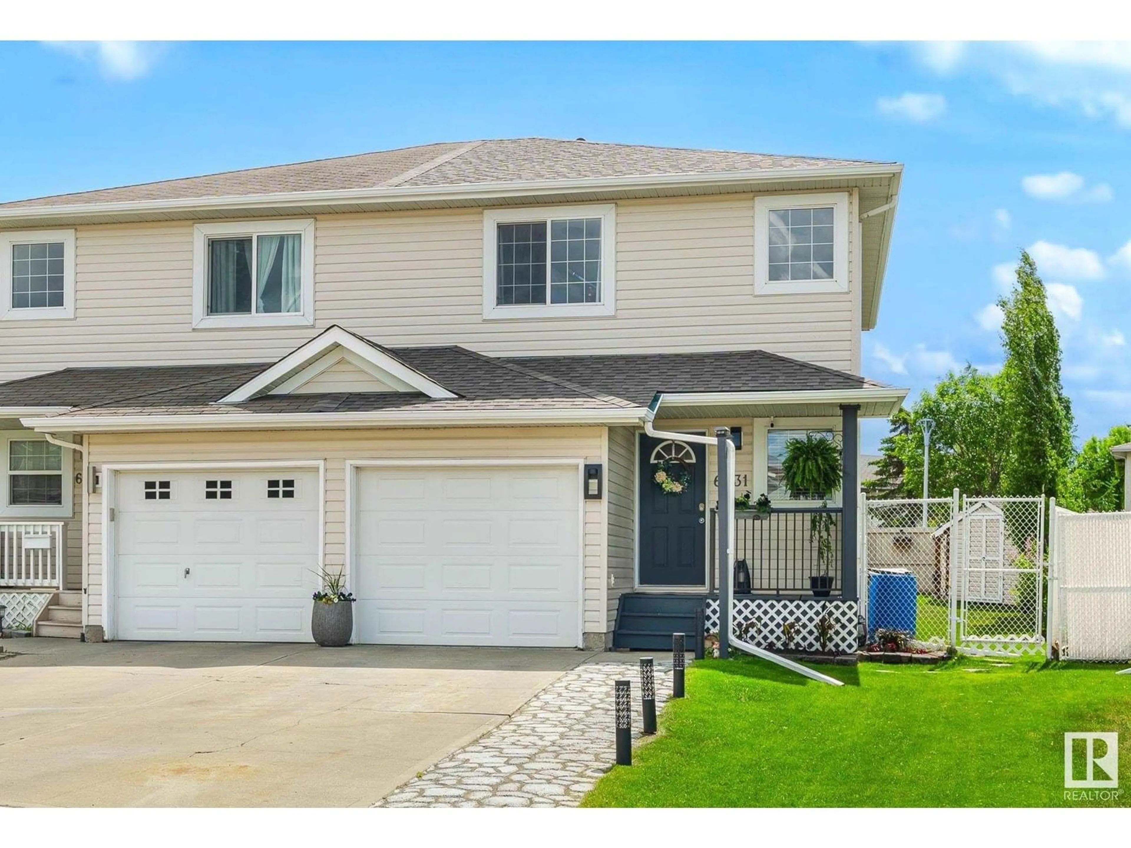 Home with vinyl exterior material, street for 6831 159A AV, Edmonton Alberta T5Z3N9