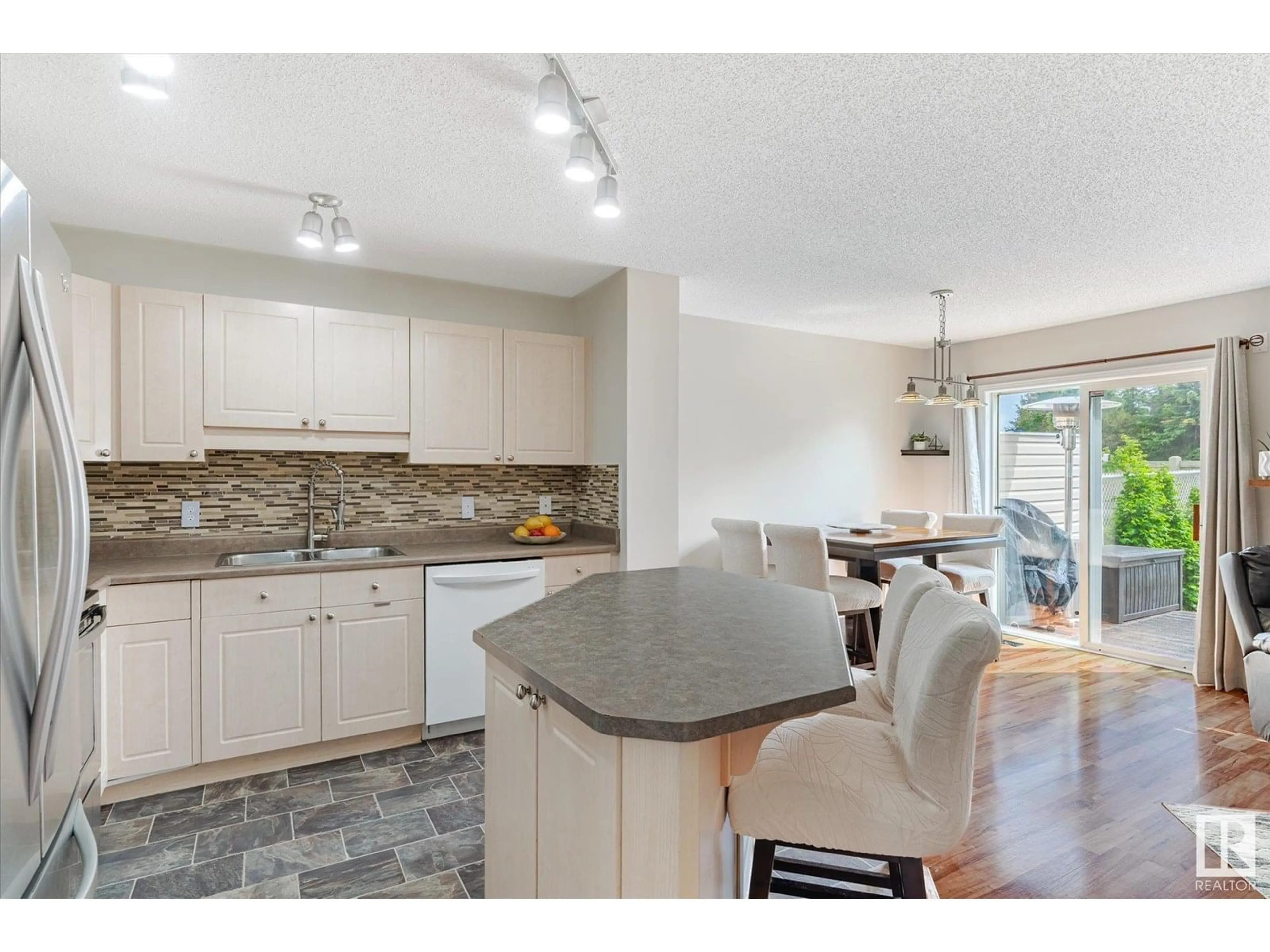 Open concept kitchen, ceramic/tile floor for 6831 159A AV, Edmonton Alberta T5Z3N9
