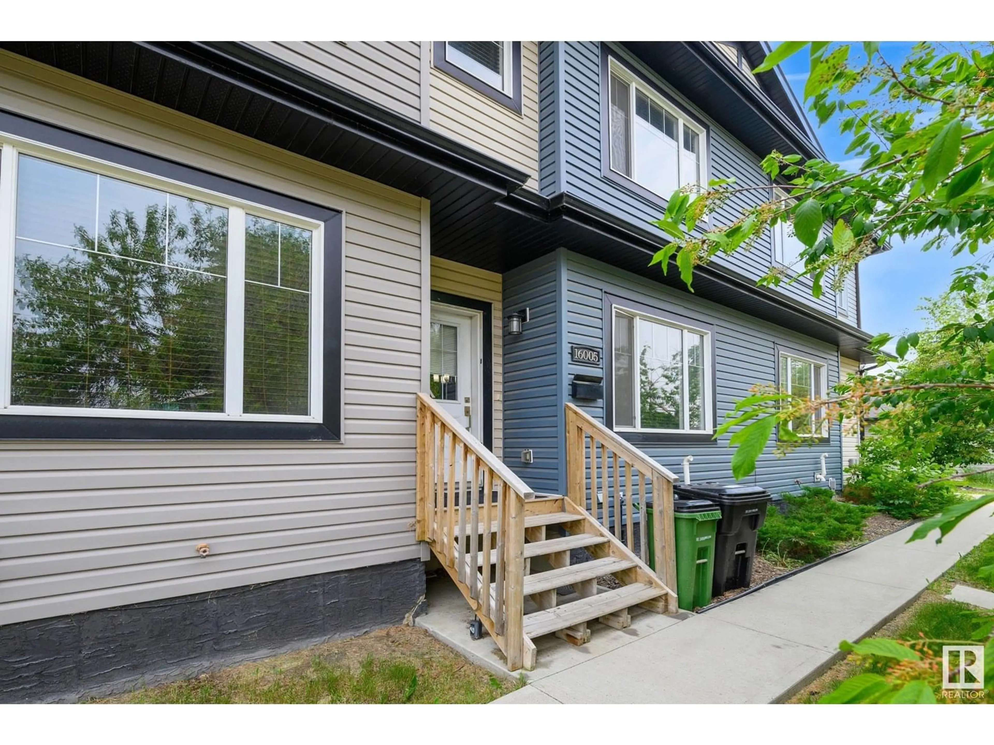 Home with vinyl exterior material, street for NW - 10152 160 ST, Edmonton Alberta T5P3E7