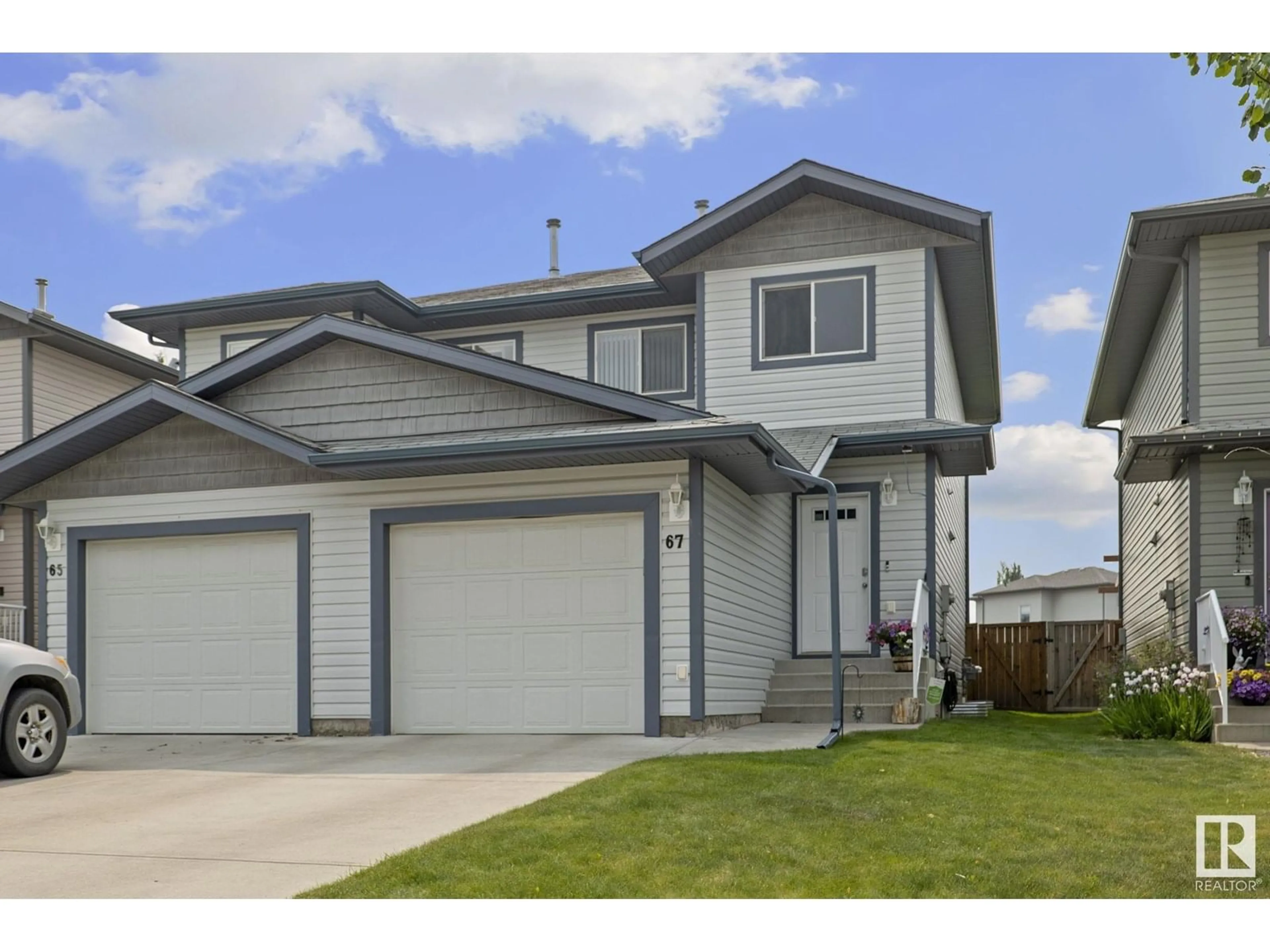 Home with vinyl exterior material, street for 67 HANEY LANDING, Spruce Grove Alberta T7X0A2
