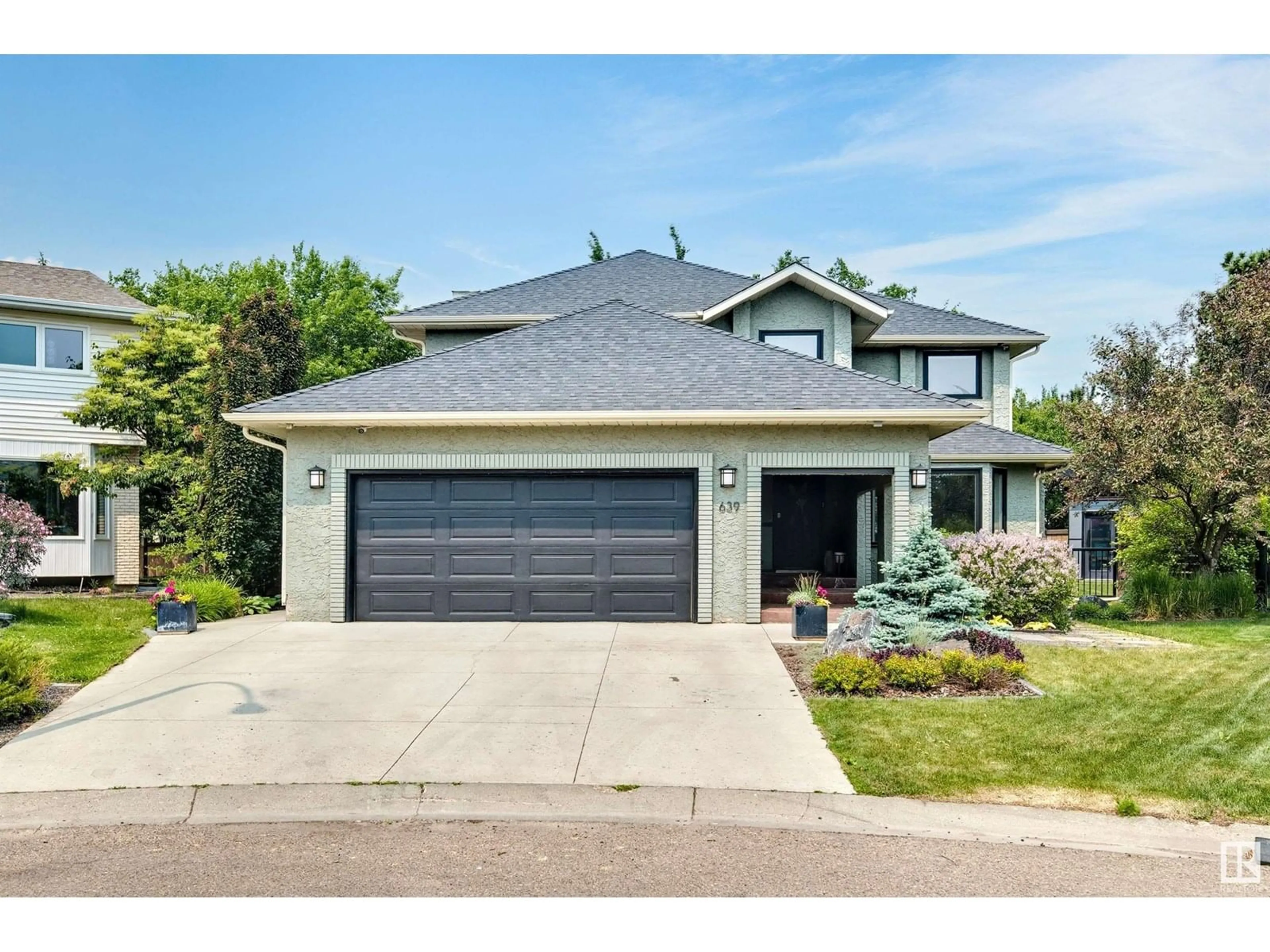 Home with vinyl exterior material, street for 639 BUTCHART WD, Edmonton Alberta T6R1R4
